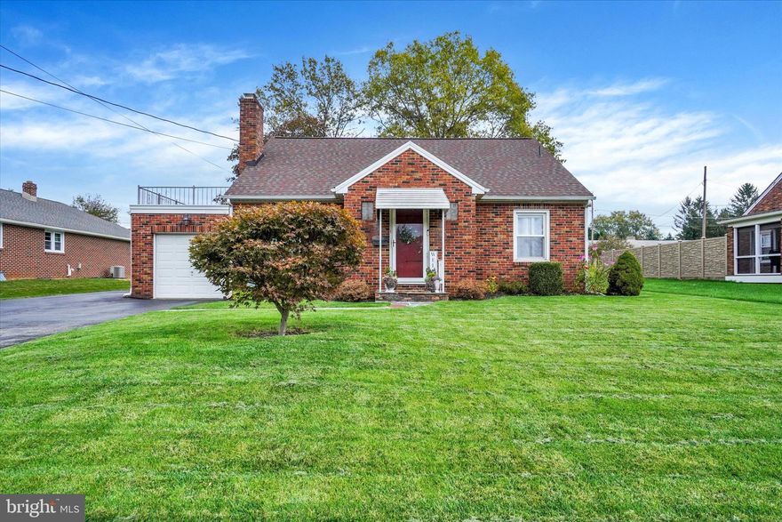 This delightful, move-in ready Cape Cod will have you at, "Hello!" Flagstone leads to the front door & entry foyer revealing a beautifully updated interior with new LVP flooring throughout. The inviting living room is warmed by a brick wood burning fireplace with gas log insert & illuminated with recessed lighting. Open dining room includes crown & chair moldings, plus a convenient breakfast bar at the threshold of the tastefully updated Kitchen, boasting granite counters, tile floors & backsplash, SS appliances & easy access to the stamped patio. Two main level bedrooms & a full bath are supplemented by a large second floor primary suite with full bath & private rooftop balcony over the garage. Additional gathering space is found in the finished basement, which offers a huge family room, dry bar, built-ins & half bath. All the baths have been updated with tasteful new fixtures & ceramic tile. Other enhancements include updated windows, new roof & new water heater.  Outside is neat as a pin, with a fantastic level yard, private patio with built-in storage, an additional storage outbuilding, 1-car garage & paved driveway with large parking pad & turnaround. Wonderful location seconds to Shrewsbury square shops & dining, & 1 mile to 1-83. This home needs nothing but your furniture! Unpack & enjoy!