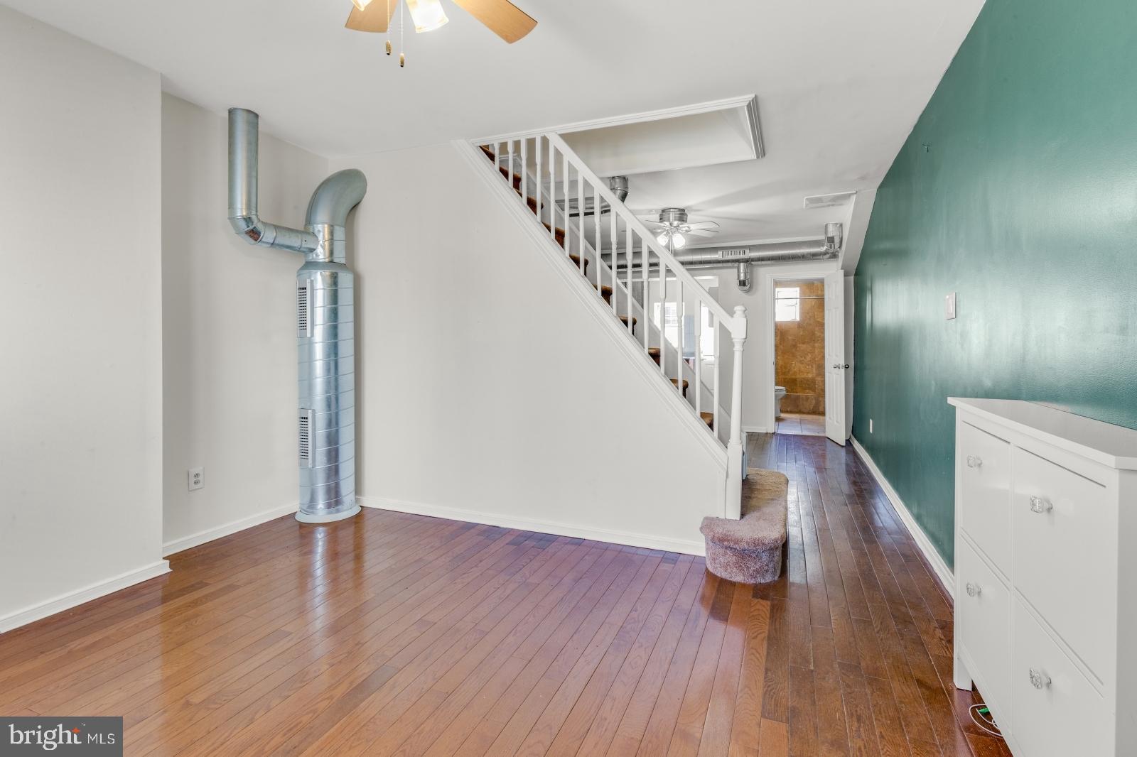 Available Early June:
Welcome to 2155 N Philip St! This is a charming 2 bedroom, 2 bathroom single family rowhome featuring central air, in-unit laundry, private outdoor space, and recessed lighting throughout. Enter into the living room with hardwood floors, a ceiling fan, and a bay window for your plants! Exposed spiral ductwork and a green accent wall elevate the space and follow you into the dining room, separated by the carpeted staircase. Your dining area is spacious with ample room for a large dining set and a ceiling fan for year-round comfort. There's a full bathroom equipped with beautiful tiling, a vanity for storage, and a shower stall. The space flows nicely back into the eat-in kitchen boasting tile flooring, wood cabinetry, and gorgeous stained glass cabinets for additional storage space. Upstairs, the fully carpeted 2nd Floor offers 2 spacious bedrooms and another full bathroom between. The 1st bedroom is painted a soft light green with 2 windows, a built-in shelf, and good closet space. Bathroom features include a lighted vanity, a mosaic tiled shower stall with detachable showerhead, and lovely blue walls that perfectly accent the blue tiling. Your 2nd bedroom is large and bright, offering tons of room for a king sized bed. There's a sizable back patio with raised flower beds and great space for a grill and patio furniture. You'll also have an unfinished basement for additional storage space and your in-unit washer and dryer. Schedule a tour today!
Lease Terms:
Generally, 1st month, 12th month, and 1 month security deposit due at, or prior to, lease signing. Other terms may be required by Landlord. $55 application fee per applicant. Pets are conditional on owner's approval and may require an additional fee, if accepted. (Generally, $500/dog and $250/cat). Tenants responsible for: electricity, gas, cable/internet, and water. Landlord Requirements: Applicants to make 3x the monthly rent in verifiable net income, credit history to be considered (i.e. no active collections), no evictions within the past 4 years, and must have a verifiable rental history with on-time rental payments. Exceptions to this criteria may exist under the law and will be considered.