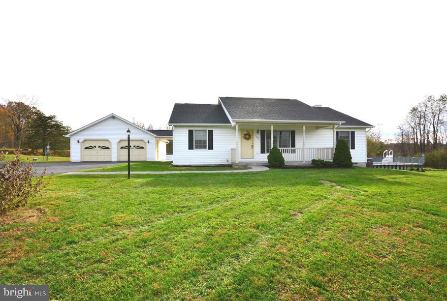 "PRICE REDUCED " ** NEW ROOF** Come and see this charming home on 5 acres. Home offers hardwood floors, gas fireplace, recessed lighting, detached 2 car garage, paved driveway, concrete sidewalks/front porch, 2 sheds, screened back porch & large above ground pool. All the convenience of living on one level.No dirt roads! LAKE ACCESS!