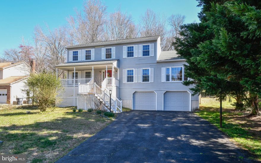 First time on the market! This home was beautiful and can be again with your TLC, paint and new flooring. Has great bones and a lot of space just waiting for you to make it your own. Main level office, formal living room, formal dining room, large kitchen with separate dining area, family room with new flooring and fireplace, plus a half bath. On the upper level, there are 4 bedrooms including the primary with a large, updated bathroom, three more bedrooms, an updated full bathroom in the hall, plus an upstairs laundry room. Newer appliances, roof, heat pumps, windows, very large, updated deck constructed of synthetic material. Plenty of parking, oversized two car garage, long driveway. Unfinished basement with rough-in for full bath. 2 HVAC systems. 2-10 Home Warranty.