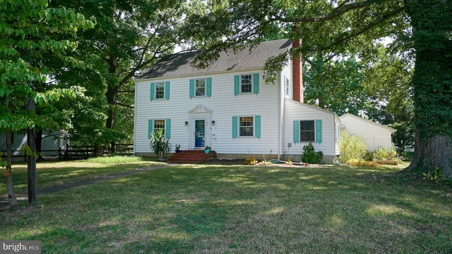 Nestled within the desirable community of College Heights, this charming Colonial-style home offers the perfect blend of classic design and modern convenience. Step inside to discover a well-designed floor plan that seamlessly integrates both form and function. The spacious living room features hardwood floors, large windows that flood the space with natural light, and a cozy fireplace that's perfect for chilly evenings.  
 The updated kitchen offers an abundance of storage and prep space and opens to the formal dining room, both with original hardwood floors.  Retreat to the three generous bedrooms, each designed to offer a peaceful haven for rest and relaxation. The master suite features a private bathroom two closets.  This property also includes a two-car garage, dual zone heating and cooling, and a basement that offers ample storage space or potential for customization to fit your needs, as well as a screened back porch and large deck area, and a fenced back yard.  This home has been lovingly cared for, with updates that blend seamlessly with its classic character. You'll find peace of mind in knowing that it's move-in ready.