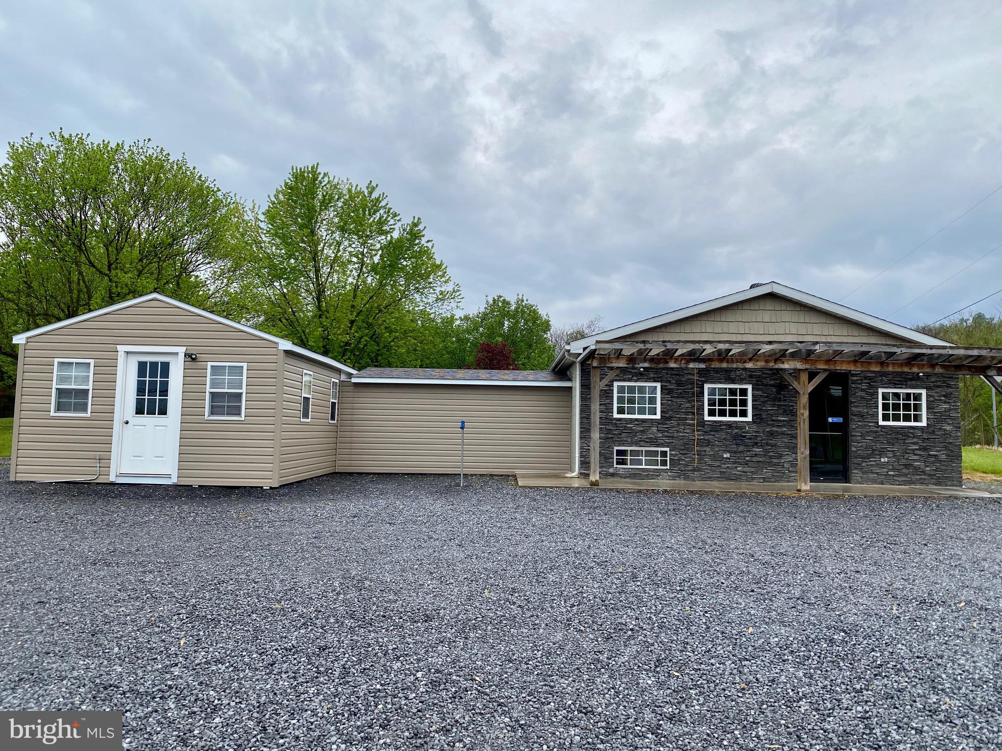 With a high traffic count this location is perfect and offers various types of businesses. Formally a small general store with a very positive cash flow offers opportunity to do the same. Other possibilities are endless. Situated on a corner just 10 minutes from I-81 and 25 minutes from historic Berkeley Springs.