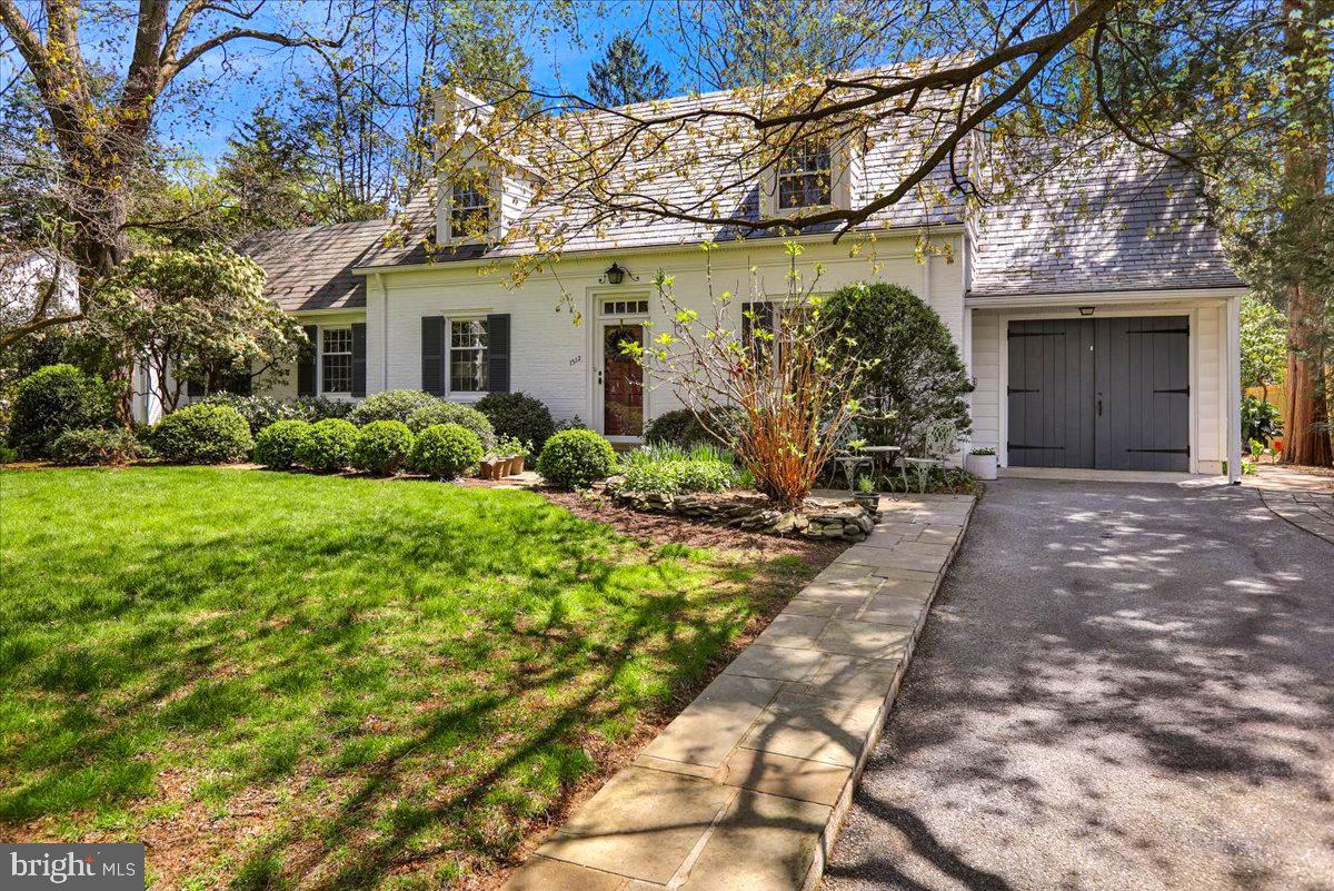 Of all the homes in School Lane Hills this may be the most preserved home by one family. This home was built in 1940 and 87 years later members of the same family own, protect, and preserve the elegant white brick cape cod. The home has been kept up to date over the years with tasteful remodeling when necessary. The electrical system is completely updated, along with central air throughout the home. The slate roof has been meticulously maintained and insulation blown into the exterior walls of the entire house to maximize efficiency, The galley kitchen opens in to the dining room which opens in to a large screened in summer family room lovingly used for much entertaining. The floors are beautifully finished dark oak unlike any product available today. On the main floor and second floor this home pays homage to the sun. Every room is bright and light and cheery.
The first floor has a paneled family room with full bath that could be used as a primary bedroom suite proving the flexibility of the floor plan.
The garden and lawn have been cared for with an assortment of perennials, shrubs and trees . Ample room exists for building or swimming pool. Needless to say the location is excellent. Walking distance to Lancaster Country Day School and access to downtown Lancaster in less than 10mins.