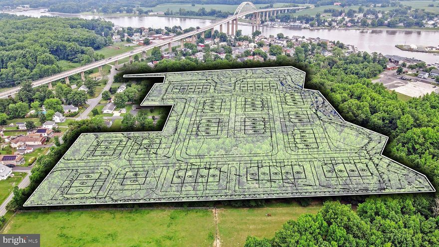 Chesapeake Village is a potential residential development situated off of St Augustine Road in Chesapeake City.  The Land has 15 acres with two potential access points off of Saint Augustine Road.  Concept plans have included 60 Villas with rear-loading garages or 52 Units with 28 Townhomes & 24 Single-family Homes.  This prime development site is adjacent to the historic District of Chesapeake City (South Side), within walking distance of various restaurants, shops, marinas, and a public boat ramp.  Located on the C & D Canal, Chesapeake City has many popular waterfront restaurants, bed & breakfasts, Air B & B’s, marinas, wedding venues, and local artisan shops.  An escape from the hustle and bustle of surrounding areas, yet minutes to major highways and other destinations.  Chesapeake City is a historic town with many beautifully renovated antique homes and is a very walkable town.  This town is primed for growth, and housing is needed.