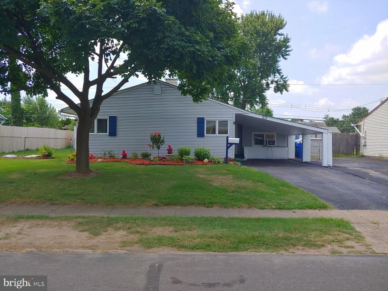Lovely expanded and totally remodeled Levittowner with expanded kitchen offering lots of New maple wood cabinets,corner double SS sink,with corner windows, ceramic backsplash,ceiling fan, tile floor( all new), and a center isle. Remodeled dinning area with w/w carpet, a laundry closet with washer and dryer. The expanded Living room shows a fireplace with a wood burning insert and w/w carpeting. Three bedrooms and a remodeled full bath. Also, there is a large sunroom. All windows have been updated, brand new sewer installed, Oil BB heat, Vinyl siding, carport. Fenced yard All appliances sold in AS IS condition.
