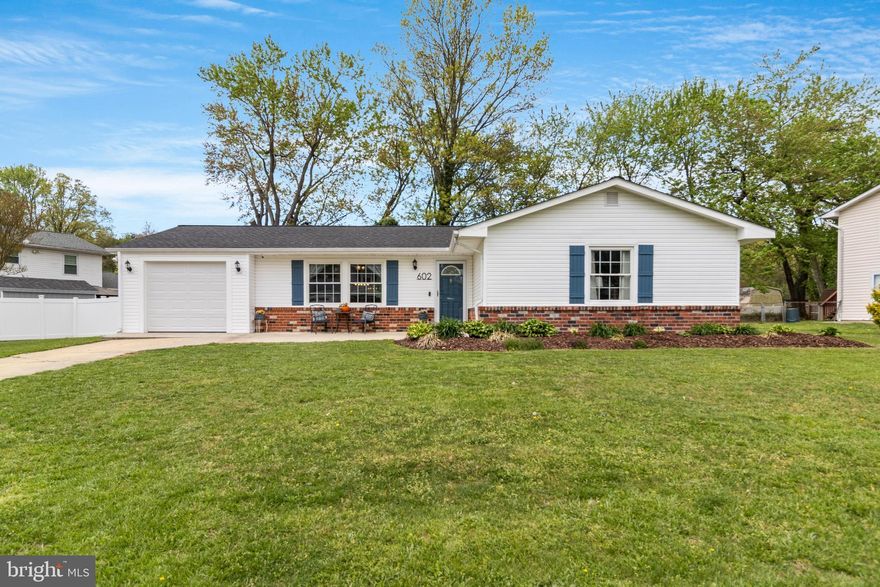 Welcome home to this beautiful brick accented rambler conveniently located in the heart of Waldorf!  With three bedrooms, two full bathrooms, and a well manicured .24 acre lot, this home provides the perfect canvas for your ideal lifestyle.  As you pull into the driveway, the landscaped front yard creates a warm and inviting curb appeal that welcomes you home.  Inside you are welcomed with beautiful LVP flooring that spans throughout most of the home, creating a seamless flow from room to room.  The heart of the home is the fully refinished kitchen, featuring new cabinetry, quartz countertops, and a stylish tile backsplash. Culinary enthusiasts will be thrilled with the new stainless steel appliances, including a gourmet 5 burner gas range complemented by a convenient pot filler.  After making your favorite meal in your new kitchen, grab a book and unwind in your family room that features an electric fireplace, custom built ins, and shiplap walls. Outside, a fully fenced backyard awaits, enclosed by 6-foot vinyl fencing for privacy and security. Entertain guests or simply unwind on the expansive deck, perfect for enjoying sunny afternoons or starlit evenings.  On top of all of these amazing features, this house also highlights a brand new roof (replaced April 2024), a 33x11 shed perfect for storage or a work shop, upgraded bathroom featuring a walk in shower with a rain shower head, 1 car garage, freshly painted, upgraded lighting throughout, primary suite with walk in closet and ensuite bathroom, no HOA, and so much more.  Located in the heart of Waldorf, this house is close to schools, restaurants, parks, shopping, and an easy commute to Washington DC, Andrews AFB, or Northern VA.  Don't miss the opportunity to make this amazing property your new home sweet home!  For a private showing, call me today.
