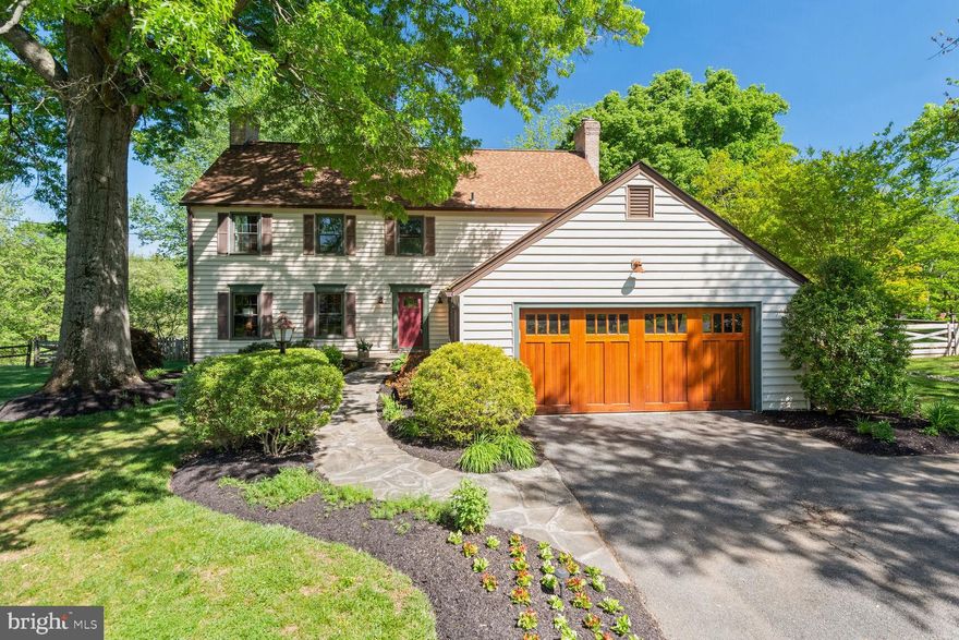 Welcome to your storybook Colonial nestled on a picturesque .85-acre lot, on the edge of a cherry blossom lined cul-de-sac in the sought after Ancient Oaks Neighborhood. This 3-story family friendly gem boasts timeless charm, modern upgrades, hardwood floors throughout, curb appeal, and offers over 4000 sq ft!. 

Step inside to discover elegant traditional living and dining areas, perfect for entertaining guests or enjoying intimate family dinners. The heart of the home is the custom chef's kitchen, featuring a 6-burner Thermador range, an oversized Electrolux refrigerator, granite counters, and soft close drawers. Enjoy the convenience of foot pedals for the sink, adding a touch of luxury to your daily routine.

Relax in the cozy family room with a beautiful stone wood-burning fireplace and easy access to the expansive deck overlooking the lush backyard oasis scattered with ancient oak trees and views of the lake. Upstairs, retreat to the primary bedroom suite with an adjoining study/sitting room, fireplace, 3 large closets, and an updated bath with a dual vanity.
Additional highlights include three spacious bedrooms, a stylish hall bath, a functional mudroom off the 2-car garage, and a convenient laundry room.

The crown jewel of this home is the expansive and private backyard with ample play space, a fire pit, a shed for gardening, a playground, lake views, and endless opportunities for outdoor living.

Recent upgrades within the last 10 years include a new roof & gutters (2016), new windows & sliding glass door (2018), new top of the line HVAC and hot water heater (2018), and repainted deck (2024). Added insulation to the basement and crawl space enhances energy efficiency.

For those seeking additional living space, the huge basement awaits your personal touches. Plus, enjoy access to a private lake for summer fun, fishing, and parties. Minutes to Kentlands and top-rated Montgomery County schools! Don't miss the chance to make this dream home yours!