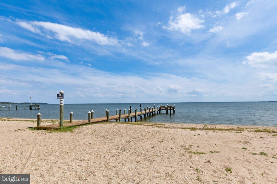 Welcome to Potomac Beach!!!  Beautiful 4 bedroom/3 bath unit with direct views of the Potomac River from almost every room. Enjoy a relaxing waterfront lifestyle and private access to an amazing sandy beach in this low maintenance community and beautiful home! Updated kitchen with quartz countertops, new appliances, breakfast bar and wine rack along with new fixtures.  The main level features luxury vinyl plank flooring throughout and expansive waterfront views.  Spacious bedrooms, two car garage with plenty of storage and gorgeous double screened in porches to enjoy spectacular sunsets!! Perfect for full time enjoyment or a weekend beach getaway being only 90 minutes south of the DC metro area. Book your showing today and enjoy this amazing home and Potomac Beach all summer and year round!!