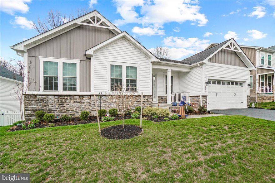 Price Reduction!   Amazing opportunity to own this Limited Offering Ranch Style Home in the Desirable Brunswick Crossing Community!!    Premium lot backing to woods and amazing sunset views.  Conveniently located on the main level, one level living at its finalist, spacious primary suite with luxury bath, a 2nd bedroom suite with a full bath, a 3rd bedroom, laundry room with washer/dryer, and powder room.  Continuing, the main level has an open family room with large windows that let in tons of natural lighting, vaulted ceilings, electric fireplace, and sliding glass doors leading onto the expansive deck overlooking the back yard.  The kitchen has stainless steel appliances, tons of cabinet space, granite countertops and a large walk-in pantry.  The center island is large and inviting and the perfect spot for gatherings. The adjoining dining area has extra windows that let the natural light flood in the main level. Downstairs the walkout basement features an enormous, finished rec room, full size windows, walk out to the concrete patio. If that wasn't enough space, there is also space in the lower level to finish and add two additional bedrooms and a bathroom (rough-in already installed) to make your own personal touches.  Enjoy all that Brunswick Crossing has to offer a swimming pool, fitness center, tennis, soccer, volleyball, basketball, walking trails, community dog parks, and shopping center inside the development with grocery store. Easy commuting with the MARC train less than 1 mile away and other commuter routes nearby.  Don't wait, schedule a showing today and make this beautiful home yours before someone else does!!