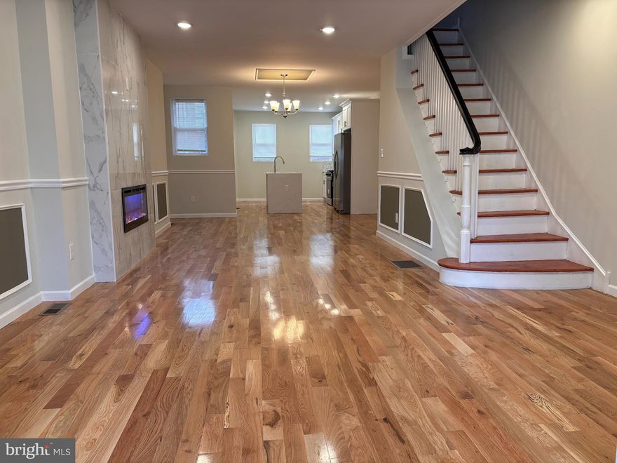 Move right in! This FOR SALE house is conveniently located in a quite Ogontz. This large 4 bedrooms 3 full bath bathrooms home is fully remodeled with elegance and comfort in mind. Open concept layout living and dining area with new hard wood flooring thru out the house, chair and base molding and recessed lighting. Living room also features one of a kind fireplace that is a statement piece. Beautiful chandelier completes a spacious dining room. The kitchen features brand new cabinets with state-of-the-art self-closing doors, quartz countertop, sleek backsplash, and all stainless-steel appliances.  The upstairs offers a master bedroom with on suite bathroom and very large closet; there are two additional bedrooms with plenty of closet space. Second floor also features a European spa like bathroom with imported vanity and elegant tile. No detail was overlooked. The finished basement offers additional flexibility perfect for a home office, gym, man cave it also features 4th bedroom and full bathroom space for entertaining with new carpet.  This property is conveniently located just minutes from shopping, dining, parks and schools, The location is perfect for commuters, as it is near all majors' highways and routes of travel. That's not all, this home features brand new HVAC, electric, plumbing, all permits have been pulled, and all inspections have been passed. Owner is a licensed real estate agent.