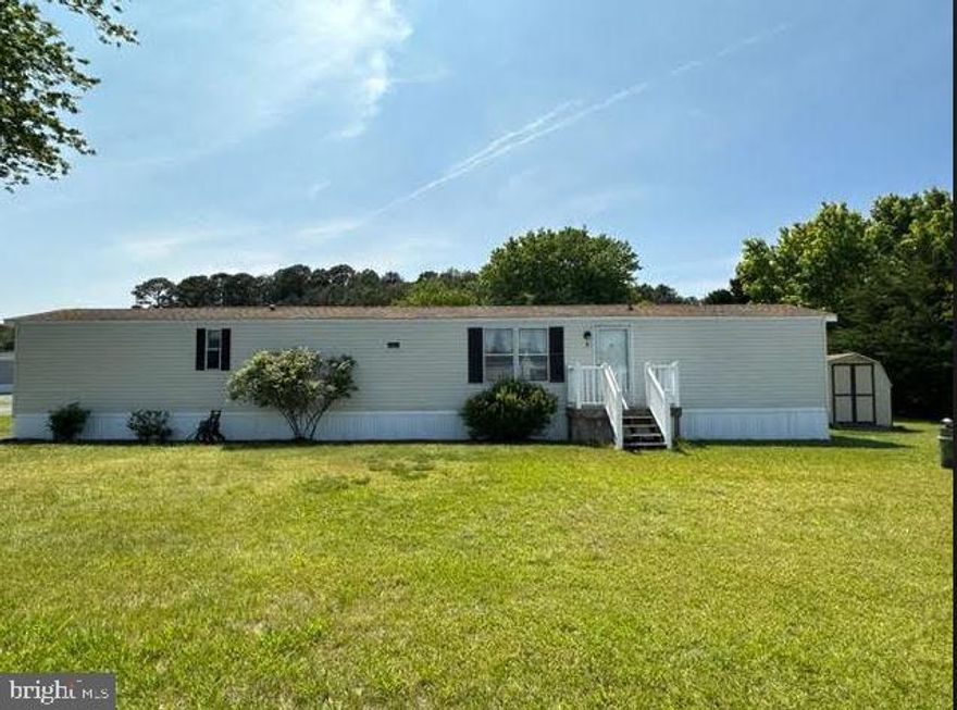 Great opportunity to own a home in Berlin without property taxes and no water/septic bill.  This home offers eat in kitchen,2  bedrooms/2 baths- each on opposite sides of the home.   Corner lot is well maintained with lots of space and Nice sized storage shed.  Sunset Lakes does not allow rentals, so all homes are owner-occupied. Great location!...You can be away from it all yet a mile from all conveniences and a 15-minute drive to Ocean City or Assateague. Ground rent covers Real Estate taxes, water sewer, and trash collection *Tax and Assessed Values are for the entire park.