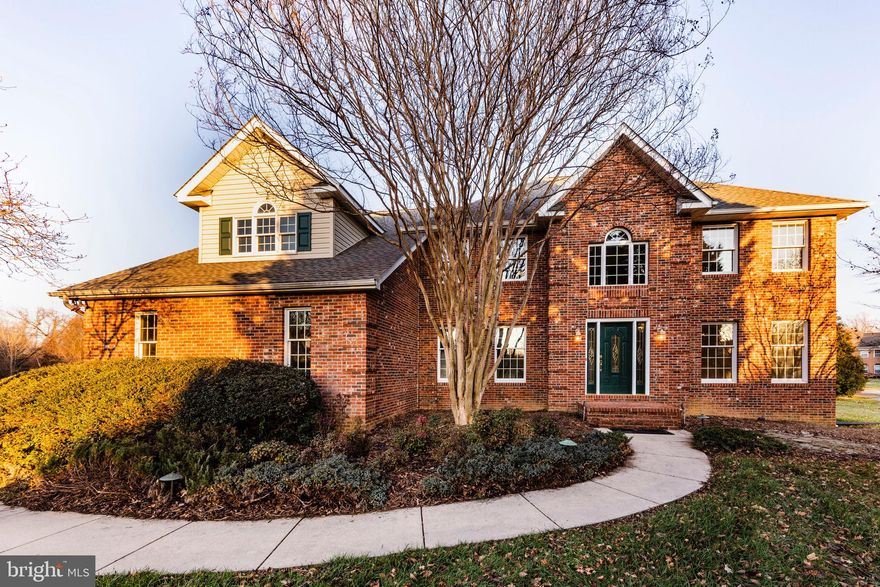 This gorgeous 4200+sqft 5bed/2.5bath Colonial with estate-like setting on over 2acres is one you won't want to miss!  A resort-like backyard awaits you with a newly resurfaced pool, newer pool house, fully fenced pool area and a tennis court! Enter into the welcoming 2 story bright foyer and be delighted by this classic beauty that has been freshly painted throughout and features gleaming hardwoods and new carpeting. Immediately fall in love with the spacious family room with cathedral ceiling and brick fireplace which is perfect for the holiday season of entertaining.  Custom wood trim and built-ins throughout the entire house.  Kitchen features a large pantry, breakfast bar, an adjacent mudroom/laundry with closet. Master bedroom suite features a vaulted ceiling, 3 large walk-in closets, linen closet, spacious master bath complete with double-vanity, glassed shower area, and jetted tub.  Full basement offers an expansive freshly carpeted recreation room, recessed lighting and  sliding door to walk-up stairs to outside.  5th bedroom area off of recreation room as well as to large storage areas with shelving. Over-sized 2 car attached, side-loading garage with room for workshop and storage.  Freshly sealed driveway.  2 large sheds at the back of the property.  Professional land and hardscaping. Private and plentiful!  This property has it all!  No HOA. Conveniently located and easy commute to Joint Base Andrews, Dahlgren, Bolling AFB, Pentagon, I-495, Washington DC and Virginia.