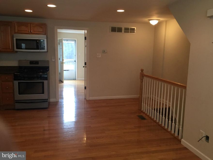 Beautiful 1 bedroom apartment with deck and storage walking distance to Frankford Arts Corridor with utilites included!  Hardwood floors throughout, this upper level apartment has a private entrance.  Enter from Front Street, where you will see new construction across the street for an amazing new large gym, just a taste of what is going on in this exciting part of Philadelphia. Once inside you have a storage area that is the perfect size for a bike, boxes, coats, etc. Up the carpeted steps you enter to see solid hardwood floors and recessed lighting, kitchen with stainless steel appliances, and a separate living room. The bathroom is large and has ceramic tile walls and floors. There is a washer and dryer in the apartment for your convenience and no running to a laundrymat! The bedroom has a large closet and a back door that leads to your private deck.  Central air keeps the apartment comfortable all summer, and don't forget the utilities are included in your rent!  Just steps away from  the El Bar, Good Spoon Soupery, Frankford Hall, Joes Steak and Soda Shop, Johnny Brenda's, La Colombe and more!