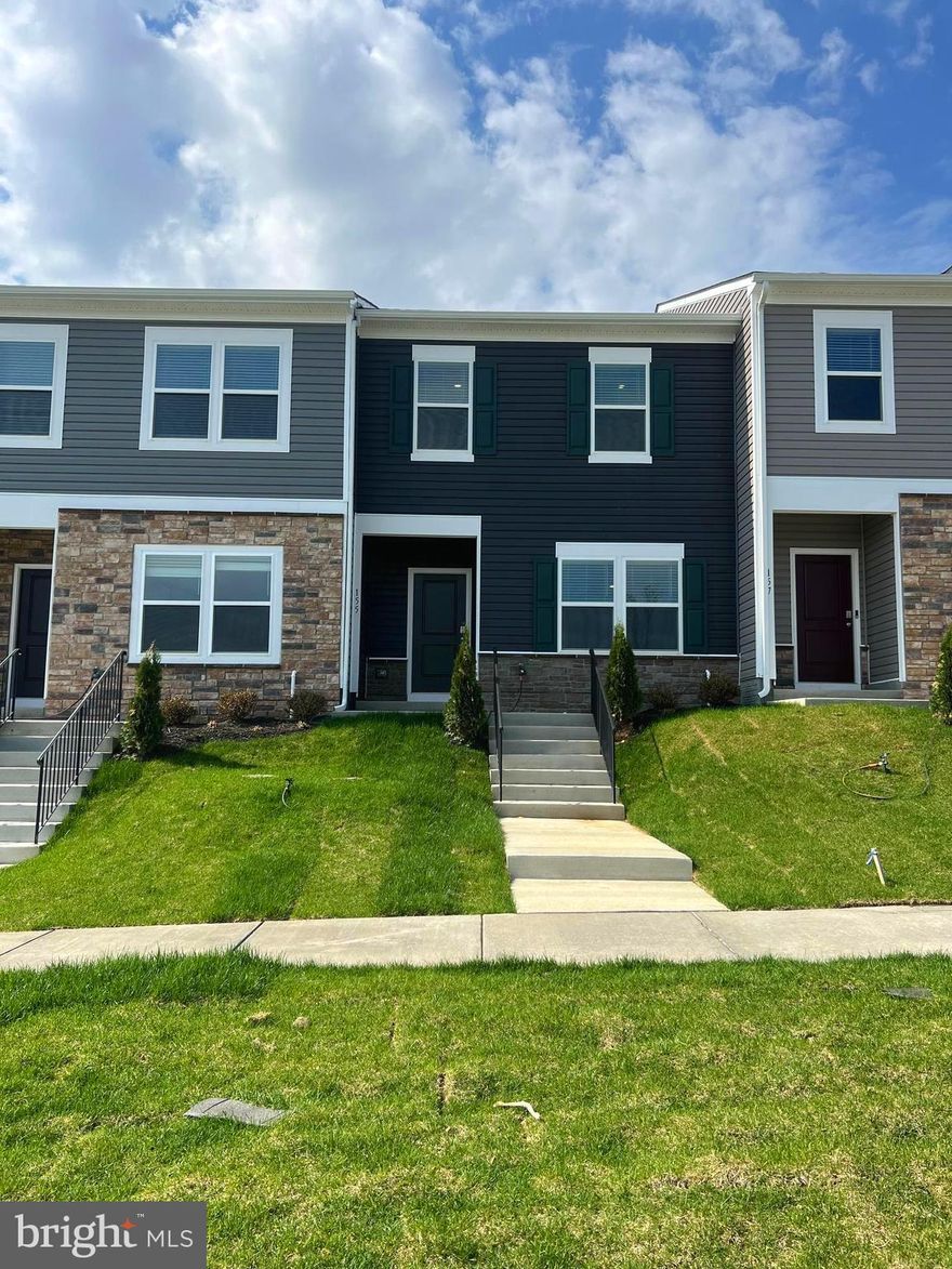 BRAND NEW 3 bed 2.5 bath townhome available for a quick move in!
The main level features a large open layout kitchen and living room combo. The kitchen boasts stainless steel appliances, granite countertops, and easy to clean LVP flooring. The main level also contains a single car garage and half bath.  Upstairs contains the 3 bedrooms and conveniently placed laundry room. The large primary bedroom has a generously sized walk in closet for all of your storage needs.
Located right off rt 11 you'll have easy access to rt37 and I-81, both are just a few minutes away.
High speed internet is available in this community - ideal for working from home or gaming/streaming.
HOA takes care of lawn maintenance.
The communities amenities include a soccer field, tot lot, gas grills, and a dog park!