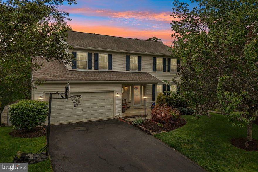 Welcome to this beautifully updated colonial in the sought-after Eaglehead Summerfield community of Lake Linganore! This is not just neighborhood it is a community. Situated on a private 0.288-acre lot backing to woods and trails, this 4BR/3.5BA home offers the perfect blend of comfort, style, and outdoor living. The main level features an inviting foyer, formal living room, dining room with chair rail and crown molding, and a spacious family room with built-in bookcases and a wood-burning fireplace. The kitchen boasts maple hardwood floors, breakfast bar seating, and new stainless steel appliances. Convenient mud room with built-ins and ceramic tile flooring. Upstairs you’ll find a spacious primary suite with a huge walk-in closet and en-suite bath with double sinks, jetted tub/shower, and linen closet, plus three additional bedrooms and a hall bath. The renovated lower level (2023) offers LVP flooring, a stylish bonus room, and a full bath with stall shower.  Laundry  made simple  with your new LG wash tower. Enjoy outdoor entertaining on the new composite deck overlooking the fenced rear yard and wooded backdrop that offers total privacy. Major updates include new HVAC, windows (2021), gutters with guards, carpet throughout, and appliances. Take advantage of all that Lake Linganore has to offer including pools, lake access, kayaking, hiking trails, and community events!