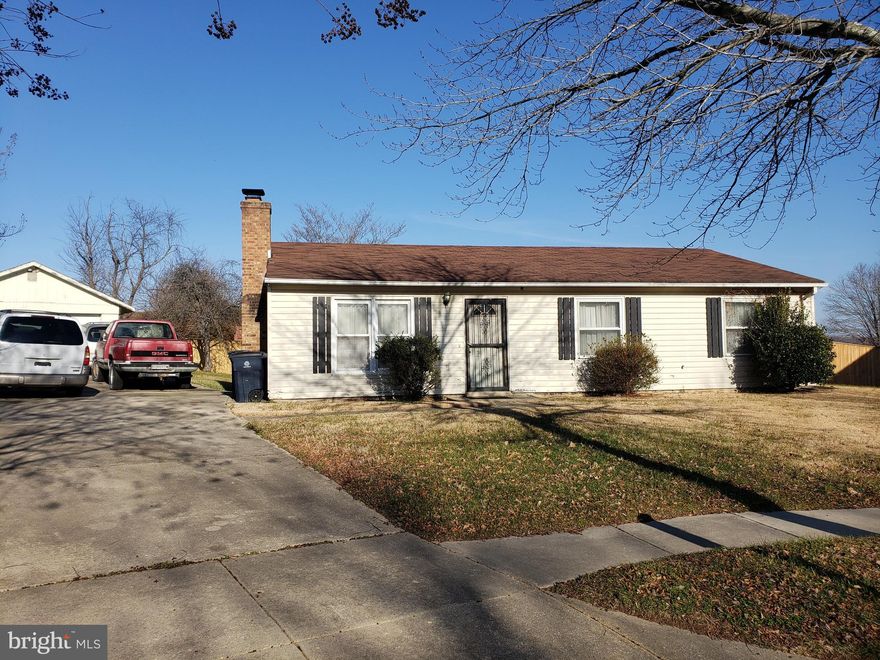 Cute 3 bedroom 1.5 bath rambler in a cul-de-sac .  Home features a fireplace in the living room, dining room with access to rear patio, 2 car detached garage