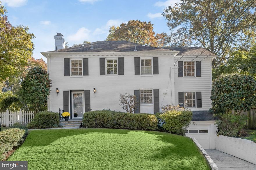 Fantastic NEW PRICE in Westmoreland Hills, a coveted neighborhood community just off Massachusetts Avenue on the DC/Bethesda line. Located across the street from  the entrance to the Little Falls and Crescent Trails, enjoy easy access to miles of trails for dog walking, running, and biking! Take a short path to the Westmoreland Hills Local Park to enjoy the playground, basketball, tennis courts, rec center and more! This lovely 3 bedroom home has been beautifully maintained and checks every box! The first floor of the home features a formal living room with a gas fireplace and patio access, a dining room with built-ins, an expansive family room just off the kitchen with large windows and additional access to the backyard, a sun-filled kitchen, a powder room and a walk-in coat closet. Upstairs enjoy a spacious primary bedroom with en-suite bathroom as well as two additional bedrooms and hall bathroom. The lower level provides the perfect space for a second family room or playroom with a quarter bathroom and plenty of space for storage. This home has a one car garage, driveway, an expansive patio for outdoor entertaining or family time, beautiful gardens with showstopping hydrangeas, and a generous side yard for additional activities!