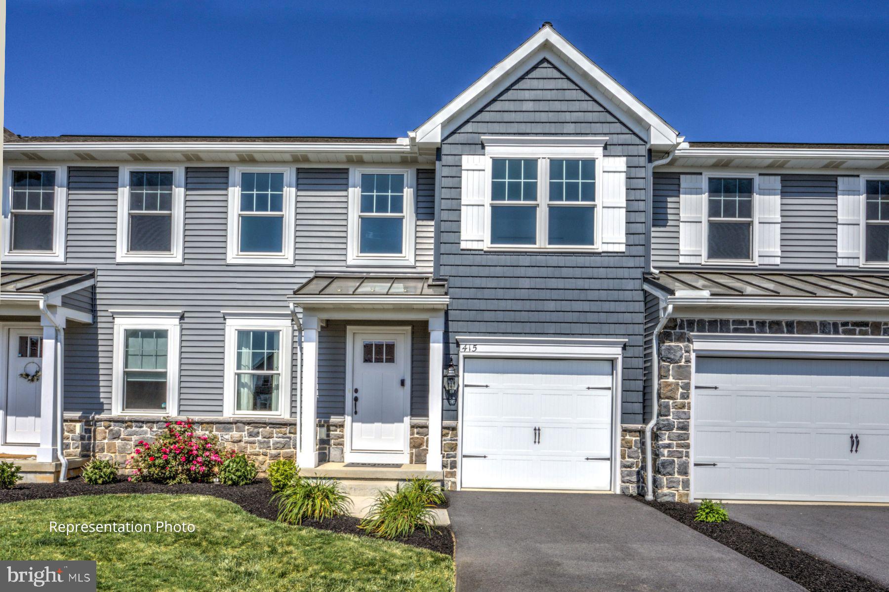 Discover modern living with the Dempsey floor plan at Mayapple Woods, a beautifully designed townhome in Annville, PA, offering 1,940 square feet of stylish, low-maintenance space. Priced at $441,990, this 3-bedroom, 2.5-bath home features an open-concept layout perfect for everyday living and entertaining. The gourmet kitchen is outfitted with quartz countertops, stainless steel appliances, and premium cabinetry, flowing seamlessly into the dining and living areas. Upstairs, the private primary suite offers a peaceful retreat complete with a luxury owner’s bathroom and generous closet space. The partially finished basement adds comfortable living space along with additional room for storage. Located just steps from Annville-Cleona High School, the community offers walking trails, a scenic creek, and convenient access to Routes 322, 72, 422, and 421—making it an easy commute to Lancaster, Hershey, Harrisburg, and Reading. Landscaping and snow removal are included, so you can focus on enjoying everything Mayapple Woods has to offer.