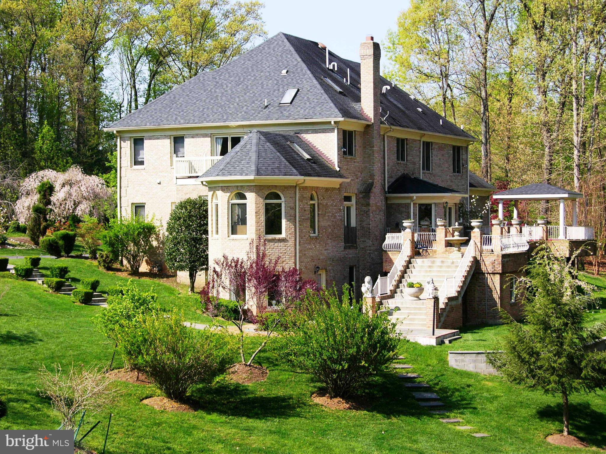 Elegant Potomac Home on an Exquisitely Landscaped 2 Acre Lot! Offers 6 Bedrooms, 6 Baths, 3-Car Garage, 3 Finished Levels w/Walk-Out Lower Level, Breath Taking Patio. Amenities include Two Story Marble Foyer, Gourmet Kitchen w/Granite Counters, Expansive Master Suite, Au-Pair Suite and a 2nd Kitchen for catering.