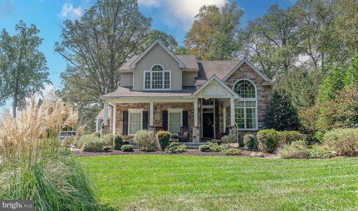 Welcome to 'Belmont II' - an extraordinary home built by Clark Turner along the fairways of the Maryland Golf and Country Club that is just yards away to hole #2. Enjoy the video tour to see first hand the elegant custom craftsmanship where every amenity has been carefully refined for upscale living.
Built in 2010 on approximately 0.57 acres, this traditional-style home delivers almost 5,000 square feet of living space, with 4 bedrooms, 4 full baths, plus a half bath. The current owners, building on the meticulous standards of the original, have added dramatic enhancements that elevate this residence into a rare find.
You will find a beautiful sunroom addition attached to the owner's suite that features expansive windows on all sides which provides an ideal haven for morning light, reading, or simply absorbing those golf course views all year round. A gas fireplace anchors the room, adding warmth and ambiance for cooler evenings.
New Oversized Front Porch & Landscaping. The façade has been upgraded with a grand, oversized front porch that makes a striking first impression. The yard has been professionally landscaped, with carefully curated plantings, mature trees, and refined hardscape that complement the stately architecture.
The gourmet kitchen features new high-end stainless steel appliances that were recently installed. The home is outfitted with a double oven, cooktop, microwave, refrigerator/ice maker and a newly installed over-sized island.
Rich hardwood floors extend through the family room, dining room, kitchen, and living areas. The family room is graced with a barrel ceiling, architectural trim, crown moldings, chair rails, built-ins, recessed lighting. The primary suite is on the main level for ease, comfort, and one-level luxury.
The fully finished basement features a dedicated theater room for cinematic evenings, a large recreation room for gathering and entertainment and a large fitness/exercise room . A wet bar area completes the space, perfect for hosting or relaxing. Additional amenities includes a large Hot Tub at the rear patio, a whole house generator with over $230,000 in upgrades through-out.