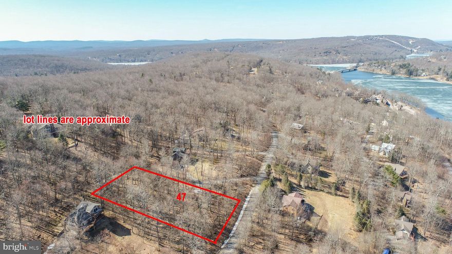 Prime Lake Access Lot in Mountainside – Perfect for Your Dream Home! Nestled on a one-acre wooded lot in the sought-after Mountainside community, this homesite offers breathtaking views of Deep Creek Lake and the ideal slope for a walk-out basement. Enjoy the best of four-season living with easy access to community lake privileges, state parks, restaurants, and WISP Resort. Plus, take advantage of exclusive amenities like basketball and tennis courts and the Marina Club. Public utilities to site. The only thing missing? Your dream home. Call today for details!