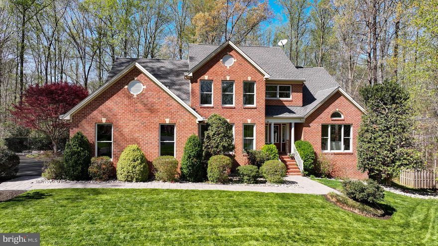 Welcome to 3509 Marthas Vineyard Way, a stunning colonial masterpiece nestled in a private, small community. This meticulously maintained home sits on 2.1 acres of beautifully landscaped grounds, offering a serene retreat with a private backyard that backs to lush woods. Designed for both luxury and functionality, this property boasts a heated saltwater pool, extensive outdoor living spaces, and a host of high-end features that make it truly one of a kind.

Step inside to discover a home that exudes elegance at every turn. The two-story foyer  adorned with crown molding and NEW hardwood floors sets the tone for the grandeur within. The gourmet kitchen is a chef’s dream, featuring stainless steel appliances, granite countertops, a wine fridge, and a spacious island, all complemented by ceramic plank tile flooring installed in 2022. The adjacent family room, with its step-down design, gas fireplace, and Anderson sliders, creates a cozy yet sophisticated space for relaxation. The formal dining room, with its oak and Brazilian cherry floors, and the light-filled living room with vaulted ceilings, NEW hardwood floors and full-length windows, provide the perfect settings for entertaining. An office with French doors and hardwood flooring adds a touch of practicality and refinement to the main level. The oversized half bath, plumbed for a full bath, offers additional convenience and potential.

The upper level is a sanctuary of comfort, highlighted by the luxurious primary suite. Cathedral ceilings, two walk-in closets with built- ins, and a gas fireplace create a retreat-like atmosphere, while the spa-inspired en-suite bathroom features double sinks, a Jacuzzi tub with an Aero system, and a steam shower. Three additional oversized bedrooms with large closets complete the upper level, offering ample space for family or guests.

The fully finished walk-out basement is a haven for MULTIGENERATIONAL  living or hosting guests. It includes a second full kitchen, an updated full bathroom, a fifth bedroom, a temperature-controlled wine room, and a gas fireplace. New Anderson sliders installed in 2018 provide easy access to the outdoor spaces, seamlessly blending indoor and outdoor living.

The exterior of this home is nothing short of SPECTACULAR! The heated saltwater pool, installed in 2015, is surrounded by three levels of decking, including a covered area perfect for lounging or dining. A firepit area, outdoor dining space with a pergola, and trails behind the home create an outdoor oasis for relaxation and entertainment. The property also features two sheds, one newly added in 2025, and a carport for additional storage.

This home is equipped with top-of-the-line systems and updates, ensuring peace of mind and modern convenience. A 500-gallon owned propane tank powers the pool and fireplaces, while a Generac whole-house generator, installed in 2024, provides reliable backup power. The home also includes a new water conditioning system (2024, Phelps), a radon mitigation system, and Anderson windows, with 75% replaced, along with sliders updated in 2018. The roof was replaced in 2020, and the two-zone Trane heat pumps are top-of-the-line.

With its luxurious features, thoughtful design, and private setting, 3509 Marthas Vineyard Way is more than just a home—it’s a lifestyle. Don’t miss the opportunity to make this extraordinary property your own!