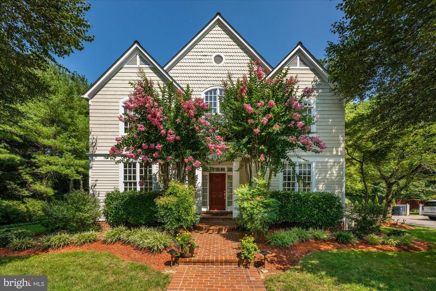 Please NOTE that this beautiful home is located on Democracy Lane, not Democracy Blvd.
Step into this gorgeous residence nestled within a private enclave of just 16 homes. Spanning an impressive 5,656 square feet on a .31-acre lot, this home offers an abundance of natural light and luxurious features throughout its expansive layout. As you enter through the grand two-story foyer, you'll be greeted by beautifully refinished hardwood floors that grace the main level. The main level boasts a library with exquisite custom built-ins, perfect for work or relaxation. Entertain guests in the formal dining room adorned with elegant crown molding. The chef’s kitchen is a culinary dream, featuring Wood Mode custom cabinetry, top-of-the-line appliances including paneled appliances and double ovens, a spacious kitchen island, granite countertops, ample table space, and built-ins. The kitchen seamlessly opens to the family room, where you'll find a cozy floor-to-ceiling fireplace. Both the kitchen and family room provide access to the deck, which features a convenient gas hookup, making it ideal for outdoor cooking and entertaining. Ascend the wide staircase to the upper level, where the spacious primary suite awaits. This elegant retreat features vaulted ceilings, two large walk-in closets, and a gas fireplace. The luxurious primary bath offers double vanity sinks, soaking tub, separate walk-in shower, vaulted ceiling, and skylights, creating a spa-like atmosphere. The upper level also hosts three additional bedrooms, each with exceptional closets, including one ensuite, and a hall bath, perfect for family and guests. The lower level offers a recreation room complete with a fireplace, providing a great space for leisure and entertainment. Additionally, you'll find the fifth bedroom, a full bath, large laundry room, and abundant storage rooms. Additional highlights of this home include custom window treatments, a wired audio system, a two-car garage, professional landscaping, and an outdoor sprinkler system. Ideally situated, this home provides convenient access to all three blue ribbon schools, Cabin John Village, Cabin John Park, Potomac Village, and major commuter routes. This residence is truly a masterpiece of design and functionality, offering a luxurious lifestyle in a serene and private setting.