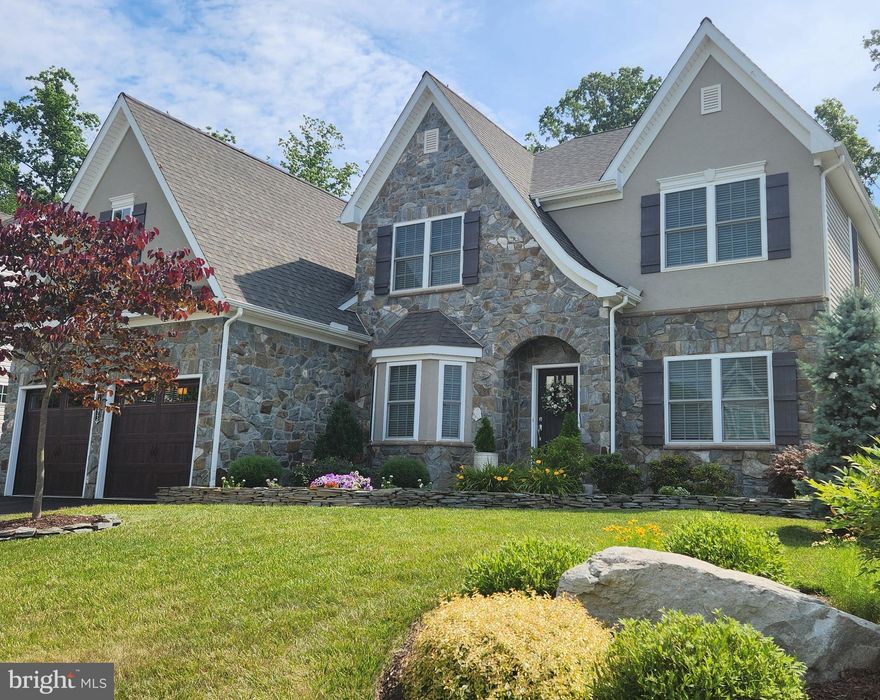 This strikingly elegant, 5 bedroom, 2.5 bath home is located in the family friendly neighborhood of Eva Mar. It is conveniently situated minutes from the heart of Bel Air and top rated schools with easy access to major thoroughfares. This 3,628 square foot Keystone Custom Home has a modern floor plan that offers a first floor owner’s suite and the perfect flow for parties and family gatherings. The bedrooms, dining room, first floor office, kitchen, and garage were all enlarged by the architect for additional living and storage space. Upgraded features such as genuine stone exterior, hardwood throughout the first floor and upstairs loft, 9 foot first floor ceilings, Craftsman style moldings and wainscoting, and a floor to ceiling genuine stone gas fireplace offer a warm ambience and the perfect balance between casual and elegant. The kitchen is a dream for cooks with 42 inch kitchen cabinets, Carrara marble backsplash, quartz counters, enormous island with an overhang for seating, separate pantry, open table area, and wall of windows. All bedrooms include a walk-in closet and the owner’s suite has double walk-ins with built-in closet organizers. The owner’s ensuite, spa bath includes a deep soaking tub, oversized shower with rain head and body jets, double vanity, water closet, and linen closet. Additional upgrades are a first floor laundry room with closet, double hung windows, gas hookup for the stove, and roughed in plumbing for a basement bathroom. The outdoor areas of this home are as inviting as the indoor spaces. Enjoy watching deer and woodpeckers in the wooded preserve behind the private, landscaped yard or from the stamped concrete patio. Relax on the oversized screened back porch with double ceiling fans, composite decking, and natural stone walls. This lovely home is for sale now and available for a mid-to-late May move-in.