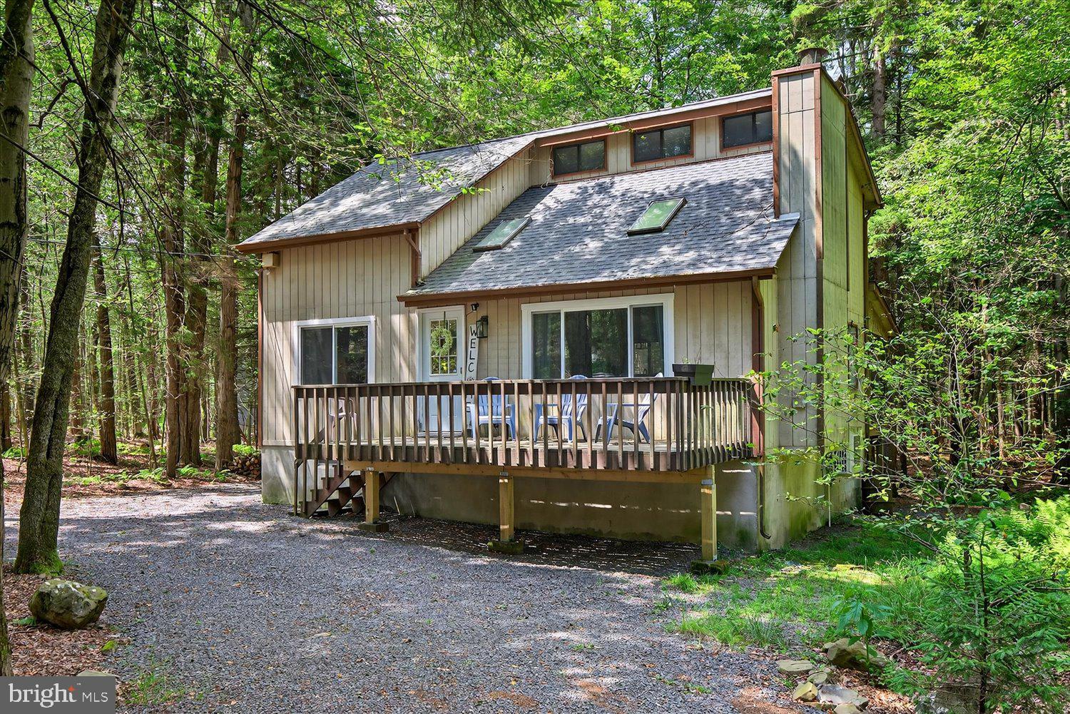 Welcome to 201 Tenicum Trail, a charming and well-maintained and updated home located in the heart of Arrowhead Lake, one of the Poconos' most sought-after gated communities. This 3-bedroom, 2-bath home offers the perfect mix of rustic charm and modern comfort, featuring an open-concept living space with cathedral ceilings, a fireplace, and plenty of natural light. Bonus - 227 sq ft Loft in addition to the 3 bedrooms, ideal for a 4th bedroom, game room or home office!
Step outside onto the spacious deck and enjoy the peaceful wooded surroundings—ideal for relaxing or entertaining. The home sits on a quiet lot just minutes from the lake, pools, beaches, playgrounds, and all the year-round amenities Arrowhead has to offer. (Which is so much, check out their website).
Whether you're looking for a full-time residence, a weekend getaway, or a short-term rental investment (This community is STR Friendly), this property is move-in ready and packed with potential. Don't miss the opportunity to own a slice of the Poconos!