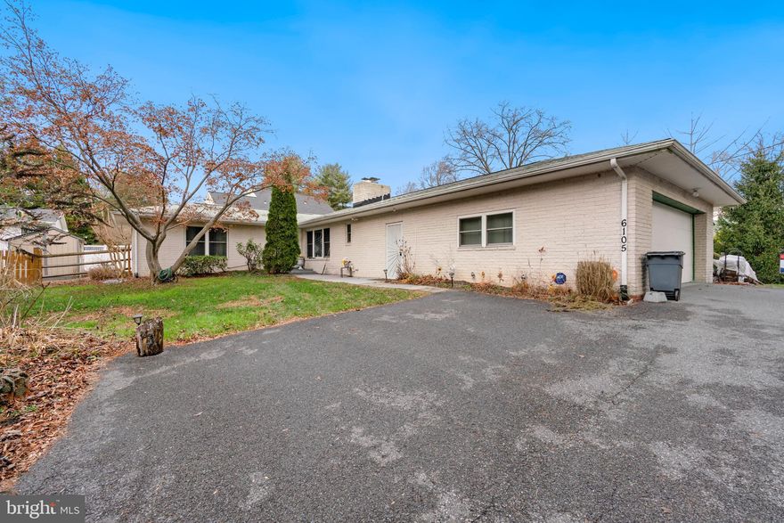 A beautiful Ranch style home located in the Village of Owen Brown community of Columbia. The main floor plan boasts a soothing color palette and gorgeous hardwood and wood laminate floors adorning the gracious living room upon entry. Warm & inviting open concept floor plan includes a family room showcasing a wood burning fireplace in a floor to ceiling brick setting, recessed lighting and breathtaking views of the landscaped grounds. The gracious kitchen features light wood cabinets, granite counters, NEW stainless steel appliances including a farm sink, a gas cooktop and opens to the dining area. The master bedroom features a walk in closet and attached bath. Two bedrooms and a full bath complete the main level. Step out to your own private serene oasis offering an expansive deck and wood fencing. The lower level is unfinished, perfect for providing ample storage and is wrapped and water proofed for added convenience. 2 car pads and a 2 car garage with additional storage.