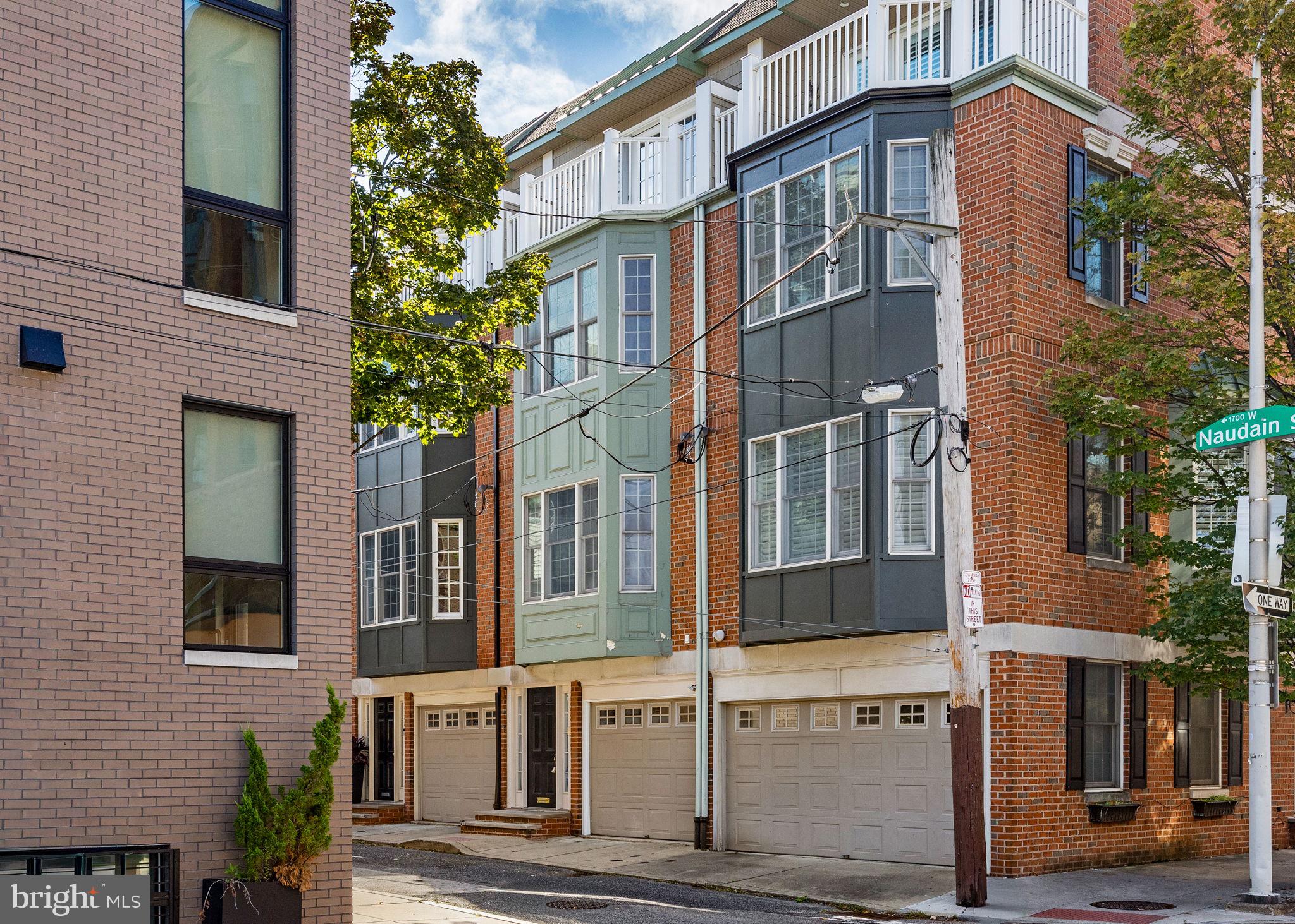 Welcome to 1740 Naudain Street, a sophisticated four-story townhouse in the heart of Philadelphia. This home boasts 3 well-appointed bedrooms and 2.5 luxurious bathrooms. Located in the Greenfield School Catchment.
The ground level offers a spacious entryway perfect for storing personal items, alongside a convenient attached garage, a powder room, and a laundry room. Step up to the second floor and be greeted by oversized windows that flood the space with natural light, highlighting the high ceilings and a beautifully renovated kitchen.
The modern kitchen, featuring an eat-in dining area and access to a deck, is ideal for entertaining or enjoying morning coffee. The third floor provides two generous bedrooms, each with ample closet space, and a full bath with a tub.
The fourth-floor master suite is a private retreat, complete with custom built-in closets, dual his and her closets, and a charming balcony offering breathtaking city views. The master bath is a spa-like oasis with a Jacuzzi tub, walk-in shower, and double vanity. Additional amenities include central AC, central heating, and a full basement ready for your personalized touch.
Experience modern elegance combined with urban convenience at this exquisite property. Plus, enjoy the vibrant city life with Rittenhouse Square just a short stroll away, offering a delightful mix of shopping, dining, and leisure activities in one of Philadelphia's most iconic neighborhoods.