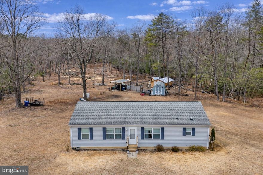 Beautifully maintained rambler on nearly 4 private acres (3.9 acres) with NO HOA, offering the perfect blend of privacy, comfort, and peaceful country living. Filled with natural light, this move-in ready home features an open floor plan with multiple living spaces, a spacious kitchen and dining area perfect for entertaining, plus 3 bedrooms and 2 full baths, including a primary suite with a walk-in closet and private bath.
Recent 2025 upgrades include a brand-new central A/C system, new carpeting, fresh interior paint, fencing around much of the property, and extensive land clearing that created a large, flat, and usable yard. The septic system was also recently serviced for added peace of mind.
Enjoy endless possibilities outdoors with plenty of room for gardening, recreation, or parking your RV, boat, camper, or extra vehicles. Conveniently located near Friendship Farm Park, Friendship Landing, and Mallows Bay–Potomac River National Marine Sanctuary for boating, fishing, kayaking, and hiking adventures.
Enjoy your own private retreat with nearly 4 acres of land, thoughtful upgrades, and easy access to La Plata, Waldorf, and the Washington, DC metro area.