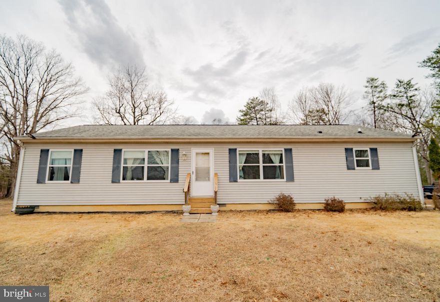 Charming ranch-style home on almost 4 acres (3.9 acres) of peaceful countryside with NO HOA. This property offers the perfect blend of comfort, space, and privacy. Recent upgrades (2025) include new central air conditioning, new carpeting, fresh interior paint, fencing around much of the property, and extensive land clearing, creating a large flat and usable yard ideal for outdoor activities, gardening, or parking for an RV, boat, or additional vehicles. The septic system was serviced within the last 6 months, providing additional peace of mind.
Inside, the home features 3 spacious bedrooms and 2 full bathrooms with a bright open-concept layout that allows natural light to flow throughout the living areas. The family room connects seamlessly to the kitchen, making it perfect for everyday living and entertaining. The kitchen includes essential appliances such as an electric range, microwave, and refrigerator. The primary suite offers a comfortable retreat with a walk-in closet, while additional features include ceiling fans and a stacked washer and dryer on the main level for convenience.
Property is near public water for fishing, boating, kayaking, and hiking to include Friendship Farm Park/Friendship Landing and Mallows Bay-Potomac River National Marine Sanctuary, which is 1 of 15 national sanctuaries.
Enjoy the tranquility of rural living while still being within driving distance of La Plata, Waldorf, and the Washington, DC metro area. Move-in ready and full of potential, this property is ready to welcome its next owner.