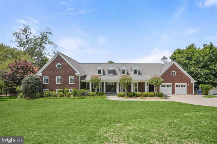 A Rare Custom Estate of Timeless Elegance and Exceptional Outdoor Living!

Completely rebuilt in 2008, this stunning New England–style home with its symmetrical façade, and exceptional curb appeal, sits beautifully on 1.1 acres of meticulously landscaped grounds featuring specimen trees, mature plantings, and extraordinary outdoor amenities. Floor-to-ceiling French doors, classic proportions, and timeless architectural detailing create an atmosphere of understated elegance throughout.

The expansive outdoor environment offers true resort-style living with a large in-ground pool and spa, lighted tennis court, putting green, and multiple patios, perfect for entertaining or peaceful relaxation.

Inside, the home offers casual but refined living space, filled with natural light and enhanced by hardwood floors. The welcoming front porch opens to a gracious foyer that overlooks the airy, open floor plan, setting the tone for the beautifully designed interiors.

The country kitchen features generous cabinetry and a walk-in pantry, and it opens effortlessly to the family room, a perfect layout for both everyday living and entertaining. A superb mudroom provides ample storage and a powder room, offering excellent functionality for modern lifestyles. The screened-in porch, located just off the mudroom, is a wonderful hangout after enjoying a swim or an inviting place to relax and take in the peaceful surroundings.

The residence includes four spacious bedrooms and five full and two 1/2 baths. The exceptional primary suite features floor-to-ceiling French doors leading to a private balcony overlooking the sweeping grounds, along with a custom walk-in closet and a luxurious primary bath with soaking tub, separate shower, and dual vanities.

The game room with its high ceilings and custom built-ins is an outstanding gathering space for family and friends. Perfect for playing or watching games, or hosting casual get-togethers, it provides an exceptional setting to enjoy time together to the fullest.

Ideally located within the highly regarded Whitman School Cluster and close to Carderock Springs Elementary school, downtown Bethesda, Northern Virginia, and Washington, DC.

A truly magnificent and rare custom offering, beautifully sited, exquisitely finished, and impossible to replicate.