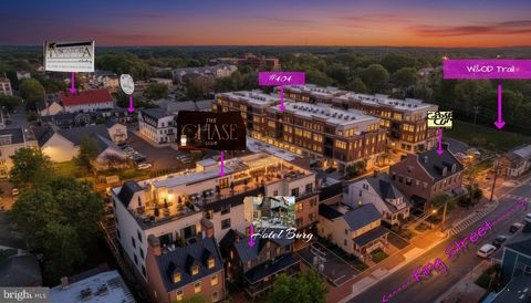 Photo of 2 Stationmaster Street SE #404, LEESBURG, VA 20175 (MLS # VALO2121418)