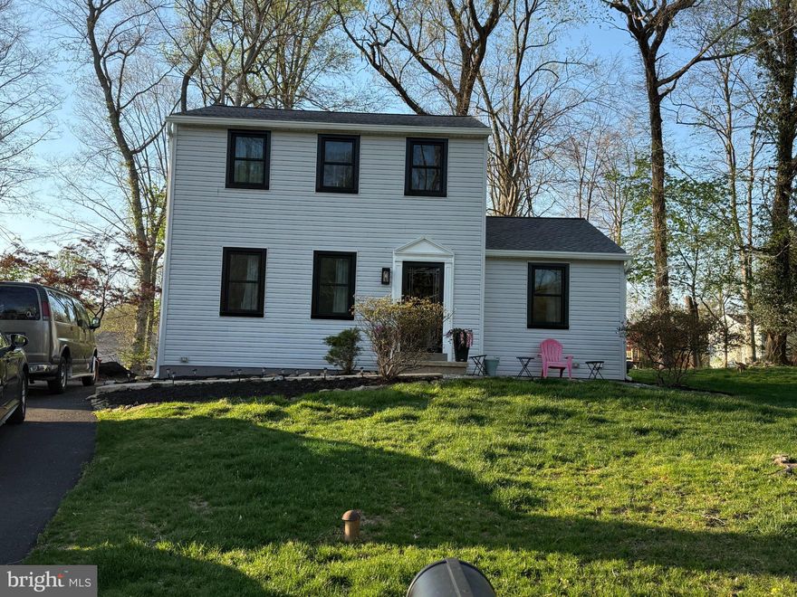 Move right into and enjoy this beautiful center hall colonial home in award-winning West Chester
Area school district offering a perfect blend of comfort, thoughtful updates, and everyday functionality, all nestled on a generous lot surrounded by mature trees and lush greenery. Appreciate the substantial upgrades, including a brand new roof, gutters, siding, windows, fresh paint throughout, a newly paved asphalt driveway accommodating up to four vehicles, and more.Step inside to discover a warm and inviting interior featuring beautiful hardwood flooring throughout. The spacious eat-in kitchen is perfect for casual meals, while the formal dining room offers an ideal setting for hosting gatherings and special occasions. The cozy living area, complete with a natural gas fireplace, invites you to relax and create lasting memories. This home features three well-appointed bedrooms and two full bathrooms, including a completely renovated main bathroom boasting ceramic tile, new vanity, mirror, and fixtures, a glass-enclosed shower with rainfall shower head—every detail thoughtfully updated. Additional highlights include central air, a central humidifier, a new hot water heater, two convenient laundry chutes (located in the main bathroom and main floor closet), and new light fixtures.
The full basement provides endless possibilities along with brand new washer and dryer (included). The rear level yard offers ample space for outdoor activities, or simply unwinding in your own private setting. property is wired with invisible dog fence and transmitter , Near top schools, lush parks, and essential services, this home balances tranquility with unbeatable access. You will be happy here!