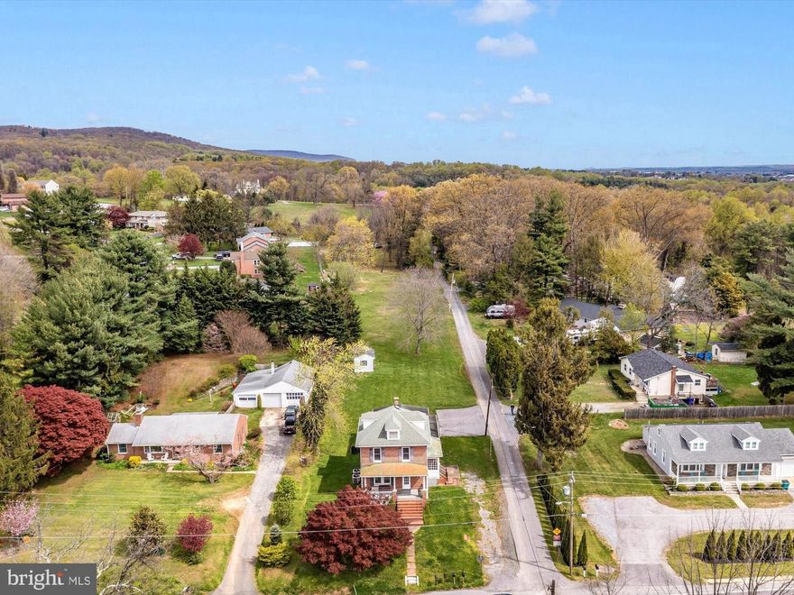 Step into the best of both worlds with this beautifully maintained 1910 home, thoughtfully updated to provide modern convenience while preserving its timeless character. From the gleaming original hardwood floors to the unpainted wood trim and five-panel doors with their vintage hardware, every detail reflects a love for classic craftsmanship.
This home features essential modern upgrades, including central air, forced air heat, and main-level laundry. Electrical wiring was updated in 2011, and both attic and basement insulation were added in 2015 for improved energy efficiency. Two new HVAC units were installed in 2018, and both bathrooms and the kitchen have been tastefully renovated.
With spacious rooms and a layout that supports both single-level living and additional living space upstairs, this home offers a perfect blend of formal elegance and casual comfort. Whether you're relaxing in a quiet sitting room or hosting friends on the deep front porch or in the generous living spaces, you'll feel right at home.
Outside, enjoy the serenity of a full acre of mostly level land, bathed in natural light—ideal for gardening, outdoor entertaining, or even raising small animals. All of this, just 10 minutes from downtown Frederick and mere minutes from major commuter routes.
Don’t miss this rare opportunity to own a piece of history—updated for today, with space to grow tomorrow.