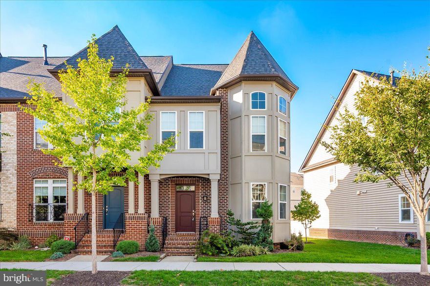 Modern Luxury in EastChurch, Moments from Downtown Frederick
Discover an exceptional blend of sophisticated design and serene comfort in this meticulously upgraded EastChurch residence. Perfectly positioned just minutes from the vibrant heart of downtown Frederick, this home offers a unique living experience where every detail has been thoughtfully curated for modern elegance.
From the moment you arrive, the home invites you in.  From the entrance foyer, lowered windows in the back entrance create a stunning sightline that draws your eye through the open-concept main level and out to the tranquil back garden. Rich hardwood floors flow seamlessly throughout the bright, airy space, connecting the living, dining, and kitchen areas.
The gourmet kitchen stands as the heart of the home. It is a chef’s dream, featuring crisp white cabinetry, gleaming Quartz countertops, a spacious central island, a convenient pantry, and a dedicated coffee station. Adjacent to this culinary haven, the dining area provides the perfect setting for memorable meals, while the living room, anchored by a custom stacked stone fireplace, offers a warm and inviting atmosphere to relax and unwind. A stylishly updated powder room with a floating sink and a chic barn door adds another touch of custom design to the main floor.
Upstairs, the private quarters include three well-appointed bedrooms. The primary suite is a peaceful retreat with its own ensuite bathroom. Hardwood floors continue into two of the bedrooms, and both full bathrooms feature contemporary finishes and fixtures.
Ascend to the versatile loft level, a flexible space designed for relaxation or entertainment. Complete with a wet bar and a partially covered rooftop terrace, this area can easily serve as a fourth bedroom, a private home office, or an elevated lounge for enjoying quiet evenings.
The finished lower level offers a spacious recreation area, ideal for a home gym, media room, or play space, along with ample storage. Throughout the home, thoughtful upgrades like recessed lighting, a handsome wood staircase, upgraded faucets, and stylish door hardware demonstrate an unwavering commitment to quality.
This EastChurch gem offers a perfect balance of refined living and timeless comfort. Schedule your private tour today to experience it for yourself.