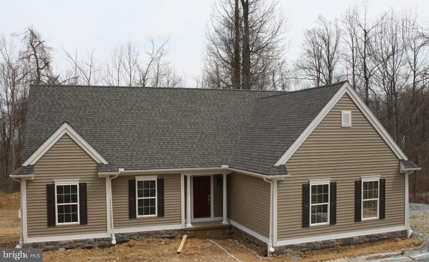 For Comp Purposes Only. Photo of similar ranch home to be built by Custom Home Group.