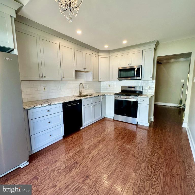 Come see this newly renovated 3 bedroom 2 1/2 bath Newtown Grant townhome in Council Rock School district. The kitchen features new gray Shaker cabinets, with 5 burner gas built in range. Beautiful granite countertops, subway backsplash, large stainless steel sink, eat-in area by the double sliding doors leading to the backyard with patio. living room with two windows and crown molding. Dining room with crown molding. All the bathrooms were renovated with ceramic tile floor and new counter tops. Main bedroom with wall to wall carpeting and walkin closet and another closet. Two other bedrooms with wall to wall carpeting. Laundry in upstairs. One car garage. Wonderful Bucks County Community in Newtown PA, Community Pool included, club house, tennis courts, & lots of open space. Close to shopping, major highways, great location. *New windows go in next week.