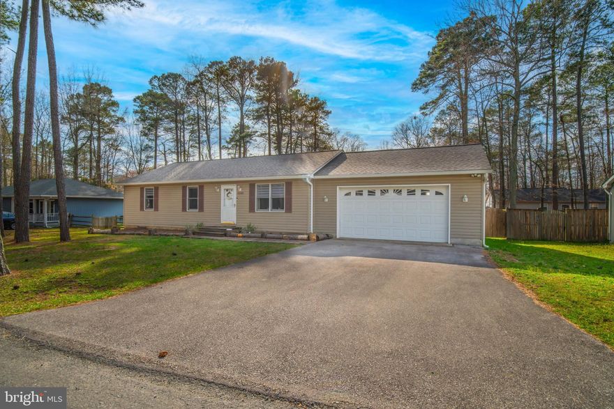 Offer Deadline for 03/23/24 at 5pm!!  Experience the perfect blend of comfort and convenience in this delightful 3-bedroom, 2-bathroom home nestled in the heart of Lusby, Maryland. Boasting 1,408 square feet of living space, this charming residence features a host of modern updates, including a newer roof, appliances, septic system, and water heater, ensuring peace of mind for years to come. The spacious two-car garage and central heating and air conditioning add to the home's allure, providing both practicality and year-round comfort. Step outside to discover a beautifully fenced, flat backyard with play equipment for children – a private outdoor oasis for family fun and relaxation. The deck offers an additional space for entertainment or quiet reflection. Situated in a friendly community, residents enjoy exclusive access to beaches, a serene lake, a lush garden area, and a myriad of recreational facilities including a golf course, airport, basketball court, and baseball field. This turn-key home is more than just a place to live – it's a lifestyle waiting for you to embrace!