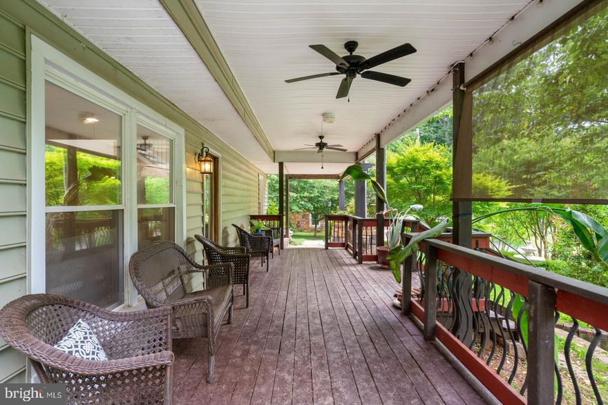 Looking to leave behind the hustle, bustle and stresses of everyday life and escape to your very own serene slice of paradise? This unique property is set on 1.8 acres of glorious land and is enveloped by lush gardens and mature trees ensuring the tranquil retreat you’ve been dreaming of.

A complete  architect designed remodel in 2015 has transformed this home into a two-story stunner bursting with bespoke detail, contemporary comforts and a long list of must-have features.

A tree-lined gated driveway welcomes you to the property and builds anticipation as you approach this one-of-a-kind residence. From the large front porch, you are drawn into the light-filled and open-plan living room, dining area and kitchen with a cozy wood-burning fireplace that ensures a warm ambience on cool winter nights.

Gorgeous windows frame the leafy outlook plus there’s on-trend flooring underfoot and a gourmet kitchen that will delight any passionate cook. Here, a suite of stainless steel appliances will make preparing meals an absolute joy along with sweeping stone countertops, a center island and an abundance of cabinetry.

Those who work from home will appreciate the main-floor office with a small flight of stairs that steps down into the family room. This sumptuous space has air-conditioning, a ceiling fan and a fireplace with a wood mantel and a brick surround that stretches all the way to the ceiling. A bedroom and a bathroom complete this main level.

Three additional bedrooms and two bathrooms are perched upstairs including the master. This private owner’s retreat has a tray ceiling and a ceiling fan, an opulent master bath, a walk-in closet and French doors that open to your very own private balcony. Imagine starting the day here with your morning coffee as you take in the glorious outlook over the property and plan your day ahead.

The long list of stunning features includes a detached two-car garage with upgraded electrical, a garden house outbuilding with electricity. There are two ponds, including one where you can enjoy a leisurely swim, and there’s a fire pit, a hot tub and sunny nooks where you can host guests and admire the serene surroundings. BE SURE TO SEE THE DRONE FOOTAGE AND WALK THROUGH VIDEO FOR THIS ONE.