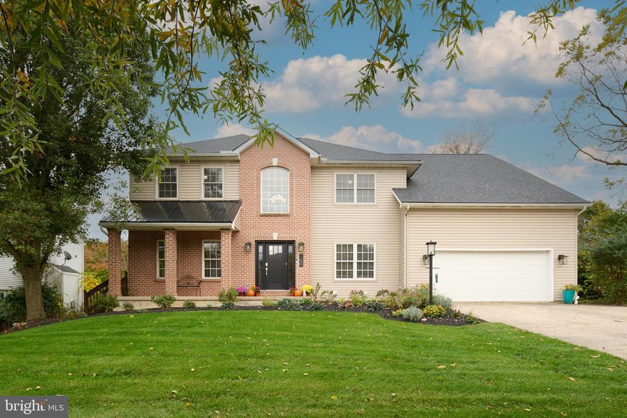 Welcome to this beautifully maintained 5-bedroom, 4-bathroom home nestled in the desirable Hillside Farm Estates neighborhood. Offering over 4,300 square feet of living space on a 0.42-acre lot, this residence combines elegance with modern comfort.

Interior highlights include formal living and dining rooms perfect for entertaining. Expansive family room with two story ceilings open to the gourmet kitchen featuring custom cabinetry, island, a sunny breakfast area, and large windows overlooking the backyard. Main-level bedroom ideal for guests or a home office. Four additional bedrooms upstairs, including a luxurious primary suite with tray ceiling, jetted tub, and walk-in shower. Lower-level retreat with fully finished basement with a second kitchen, versatile space for a home theater, recreation room and full bath. Large unfinished storage area and full laundry facilities. Two-car garage, central A/C and heat pump. Cecil Irvin Park is right across the street. This home offers the perfect blend of space, style, and functionality in one of State College’s most sought-after communities. Whether you're hosting gatherings or enjoying quiet evenings, 100 Lois Lane is ready to welcome you home.