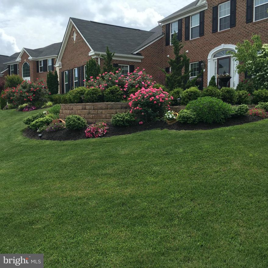 Absolutely beautiful--former model and yard of the month winner--Corner lot with exceptional landscaping to include underground irrigation system. 3 Car Side-Load Garage. Large owner's bedroom with tray ceiling, 2 walk-in closets, and siting area. Kitchen has all the upgrades--granite, stainless steel, hardwood floors. Community amenities include swimming pool, clubhouse, trails, tennis courts.