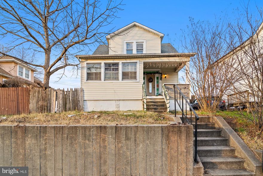 Alert investors 6708 German Hill!  Could be used as a two unit property with potential rental income or transformed back into 1 unit! This home, complete with a spacious rear yard and detached garage awaits your personal touch. Boasting four bedrooms and three full baths (1 full in the lower level), this home is a rare find, offering ample space for comfortable living. Property is being sold AS IS, seller will make no repairs. Seize the opportunity to customize and make this home your own!