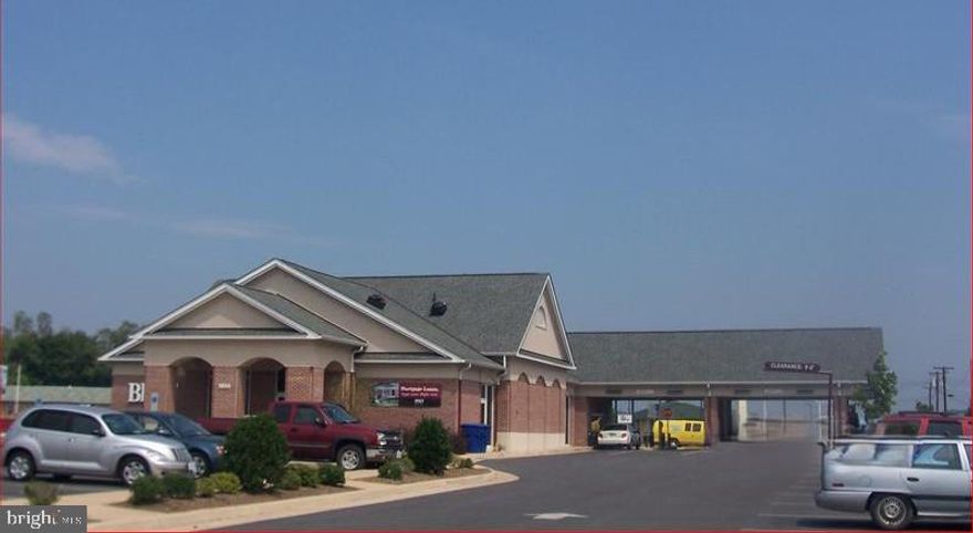 **PHOTO IS NOT CURRENT** drive up window has been removed/partial demo
Former Bank
5,344 SF
Zoning C-1
Renovation started
Drive up window has been removed
Partial demolition
Superior retail location