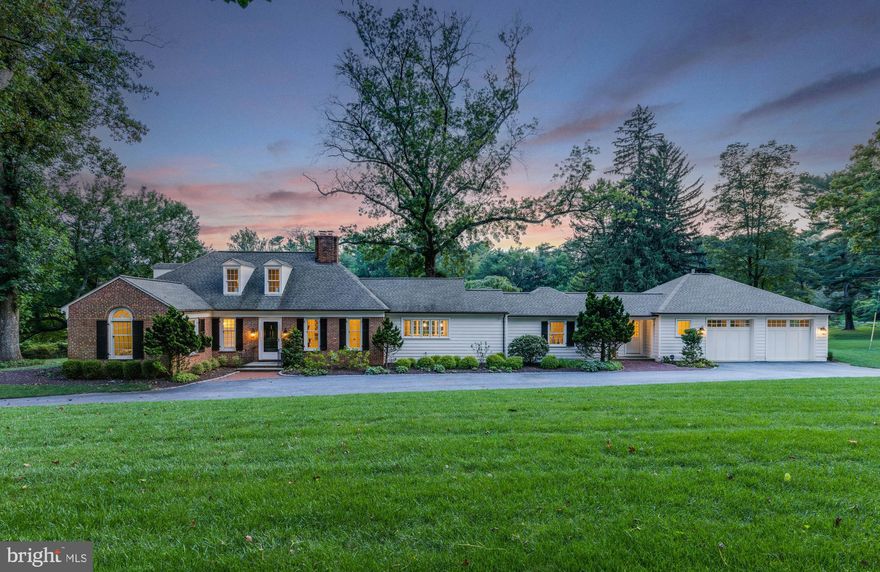 Quietly tucked away in the back of the Green Spring Hunt Club community awaits one-level living perfection. With an understated entrance and the most charming drive in, filled with picket fences, incredible trees and neighbors on golf carts, it’s no wonder this locale is one of Baltimore’s most coveted hidden gems. Nestled in the back on an expansive 3.19 acre lot, this story-book stunner has been completely remodeled in 2021, with nothing left to do but move in and enjoy. With Peter Ratcliffe’s vision as the foundation, this home was stripped to the studs and completely rebuilt and expanded by Arma-Gesch Builders. That same exterior charm, just now infused with modern amenities such as oversized garage and spacious mudroom. Step in the front door to a bright, light-filled home with gorgeous timeless finishes and walls of glass drawing your eye outside. Generous spaces and a flexible, open layout that can adapt to your needs. In the center lies the custom kitchen of your dreams designed and built by Baldwin Mill Cabinetry, with top of the line Subzero and Wolf appliances, Taj Mahal Quartzite counters, and an expansive 10 ft island for gatherings. All new oversized windows line the walls in every direction with lush backdrops serving as natural artwork. Main level includes a bright and uplifting primary bedroom with gorgeous bathroom and breathtaking custom closet as well as additional secondary bedroom and lovely hall bathroom. Upstairs you’ll find a private en-suite overlooking the golf course. Step outside through the stately floor to ceiling glass sliders onto new bluestone patio overlooking sprawling lawn and the 6th hole in the background. If you are searching for easy one-level living in an unmatched setting, this is it. Showings will begin at Open House, Wednesday September 3, 12:00-3:00. The art of uniting human and home.