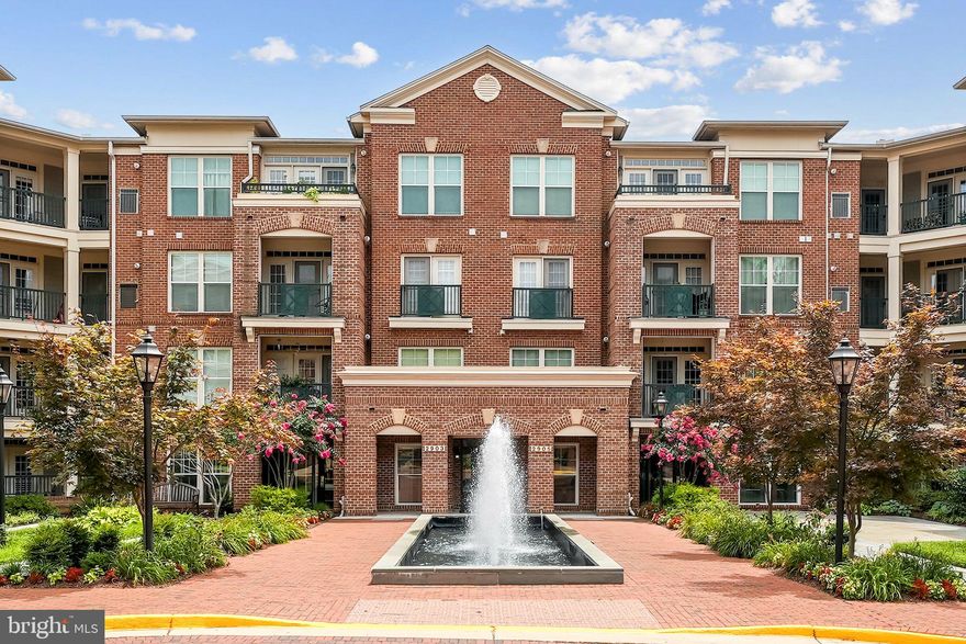 Welcome to 2903 Saintsbury Plaza, the jewel of Fairfax/Vienna active-adult living communities. A rare opportunity to own this exceptional two-bedroom / two-bathroom condominium suite boasting over 1,200 square feet of beautifully appointed living spaces in the highly sought-after active adult (55+) community of Saintsbury Plaza.  Meticulously maintained and cared for with love by the current owner, this condo suite showcases an open concept floor plan with tremendous natural sunlight & nine-foot ceilings throughout.  Featuring exceptional upgrades throughout including hardwood floors, low-pile looped-style carpeting, extravagant crown molding & trim work detail, designer lighting fixtures, stainless steel appliances, recessed lighting, walk-in closet, dual-sink vanity… and so much more!  Step outside the living room’s French doors onto an expansive covered balcony to enjoy your morning cup of coffee or to tend to your perfect urban garden.  Also included with this residence is a private assigned parking space (UNIT1-7) & separate storage unit (S33) for all your seasonal items. 

Convenience at its finest! Concierge services are available to all residents including a resident front desk manager who will accept and secure your package deliveries, as well as make certain your guests arrive to visit you with ease. Make sure to check out the community calendar of events as you enter the building to check out all the wonderful daily social activities happening throughout the month.  Events happen year-round and include Friday night happy hours, holiday parties, Halloween parades, Oktoberfest, book clubs, card nights, and so much more!

Established in 2006, Saintsbury Plaza is provides an intimate setting in a prime location just across from the Vienna Metro Station, and can place you in the Town of Vienna, Mosaic District, or the heart of Tysons in under 10 minutes.  Homeowners also have easy access to major roads & highways, two major airports, public transportation, and daily conveniences. This vibrant community of residents can stay active and social any day of the week as they please.  Enjoy the neighborhood’s natural setting by utilizing the outdoor patio spaces or through scenic strolls along the walking/biking trails. Amenities are located within the main building (where this unit is located) and provide access to the club room, fitness center, game room, catering kitchen, and library.