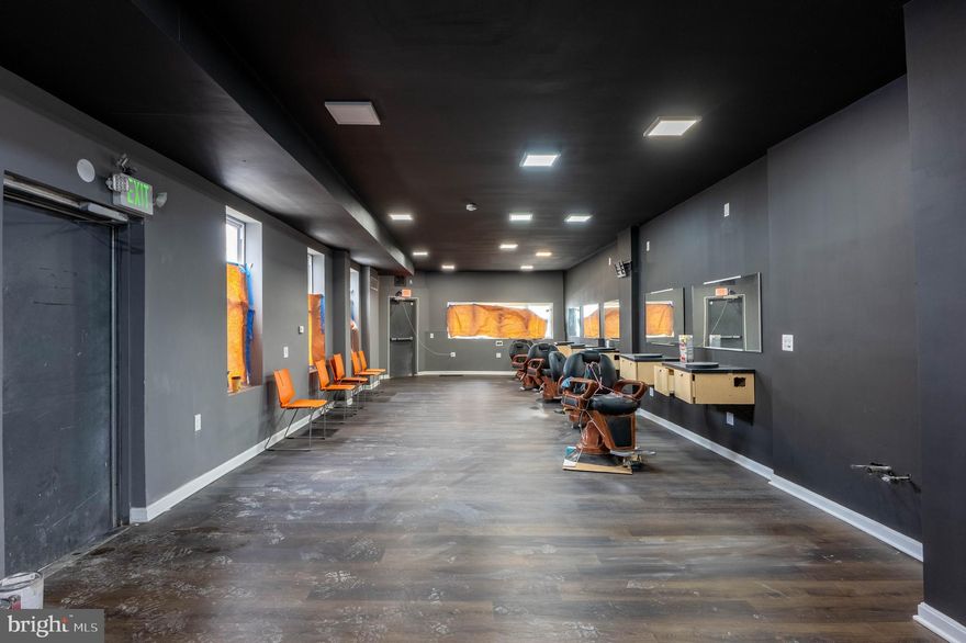 Wow Look at this mix used Property Currently is set up as a Barber Shop and Three rental units and a studio Unit, Updates Galore Freshley Painted throughout, Brand New Floors, Appliances Bathrooms Way too much to list, This will not last!!