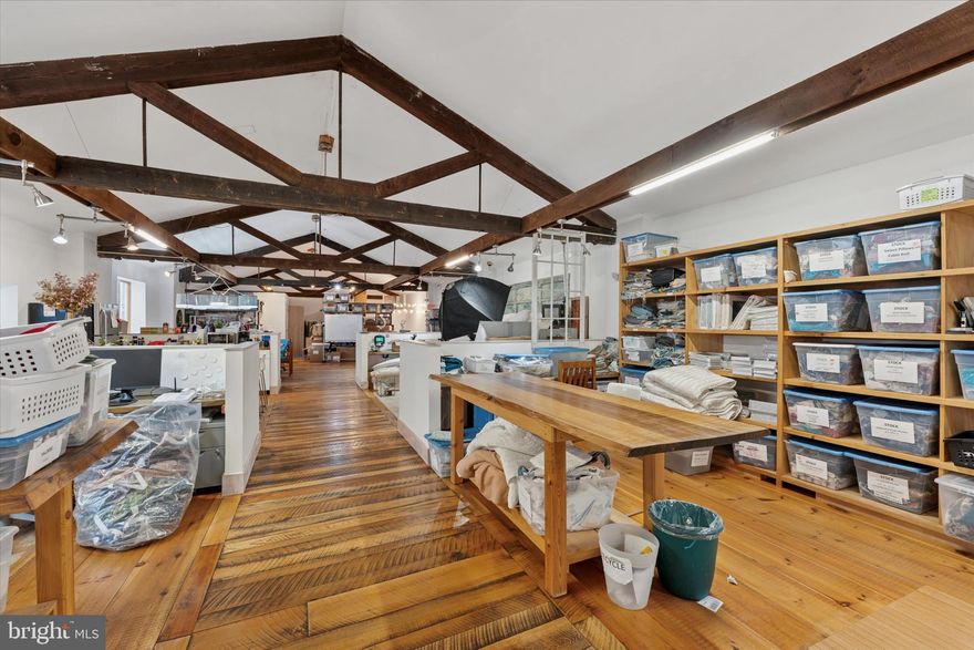 This stunning two-story space with CMX-2 zoning and dual street frontage in the heart of South Philadelphia was originally opened in 1914 as the Southern Theatre, a neighborhood movie venue showing films through the 1950’s, when it was converted to office/meeting space. Most recently used as office-maker space by a textile business, the property is now fully available for immediate use or repositioning. The building was renovated by the current ownership in 2012, including the installation of custom, wide plank hardwood floors and windows throughout the spacious second floor, seamlessly integrating modern features with historic charm. The property offers block-to-block access, 14-foot ceilings, two rear off-street parking spaces, and prominent signage potential. The zoning allows for flexible mixed-use commercial possibilities. Now available below replacement cost for the right business or investor. With direct access from Broad Street to Carlisle Street, this property offers excellent visibility, off-street parking, and a flexible interior layout ideal for owner-users, creative office, medical, wellness center, showroom, light industrial operations or residential units. With $20+ PSF in market rate rent being achieved in surrounding properties, the property could be an excellent commercial investment property or allow an owner user to use one floor and lease out the other. Strategically located just two blocks from the Ellsworth-Federal SEPTA Station on the Broad Street Line, 1412 S Broad Street sits within a dense urban corridor with over 113,000 residents in a one-mile radius and an average household income of over $117,000 within a half-mile. Surrounded by strong retail anchors such as Target, Sprouts, PetSmart, Starbucks, and Giant, this property benefits from both high vehicle (21,000+/day) and pedestrian traffic. The new One Thousand One development just blocks away adds thousands of residents living within walking distance of the property, on top of the existing recent influx from developments like Lincoln Square and the Armory. Don’t miss this chance to acquire a versatile South Philly asset with strong underlying land value, long-term upside, and immediate owner-user potential. Contact the listing agents to schedule a private tour or request more detailed financials and zoning insights. See attached VIDEO for more on this unique building's history.